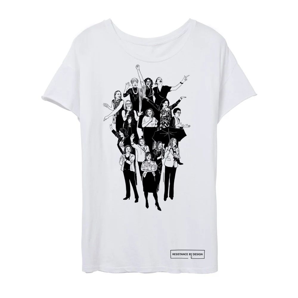 Black and white illustration of diverse women and a man, standing in various poses, with some holding umbrellas or raising their hands, on a white T-shirt. Small text at the bottom reads 'RESISTANCE BY DESIGN'.