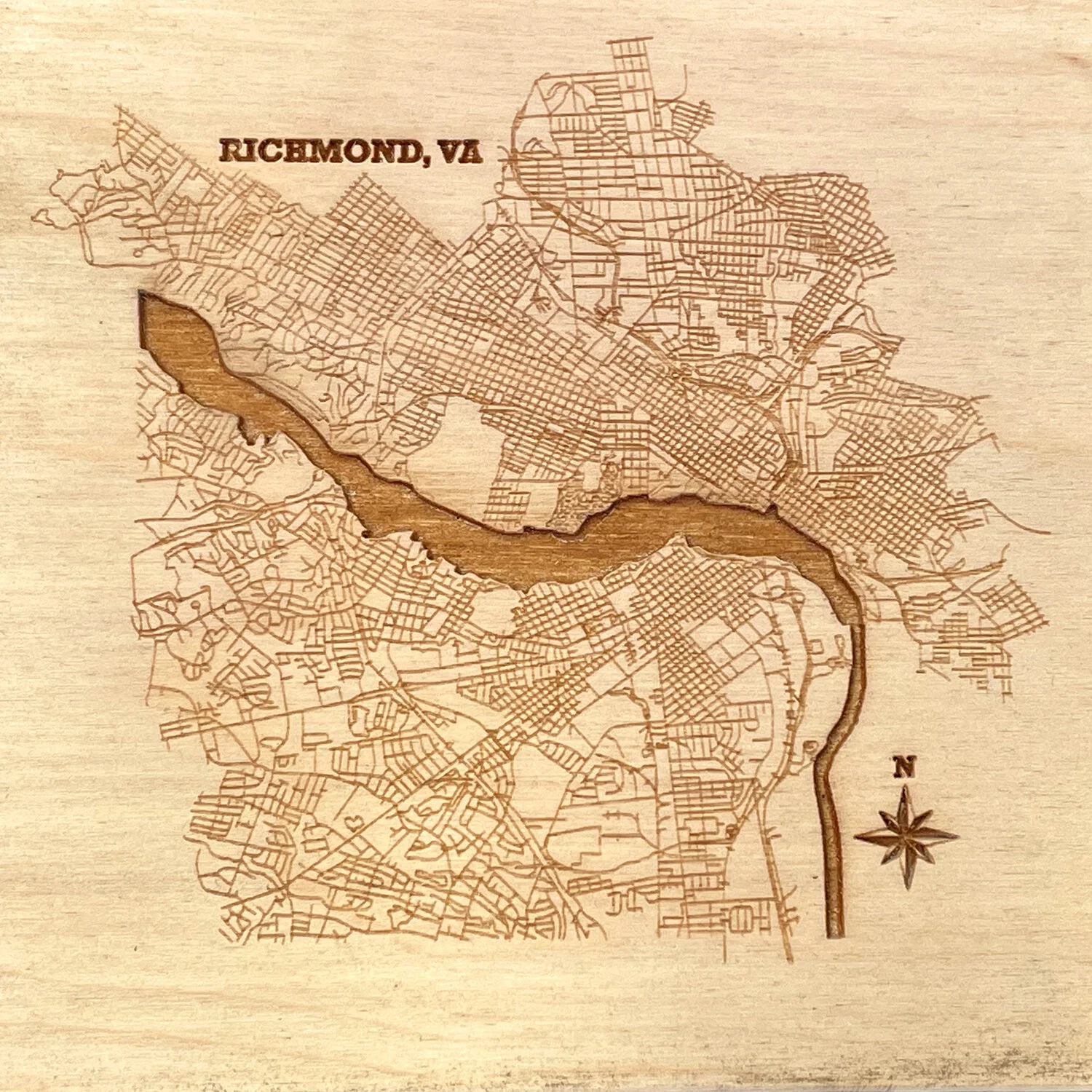 CNC routing of large-format sheet materials with custom designs at Tektonics Design Group in Richmond, VA.