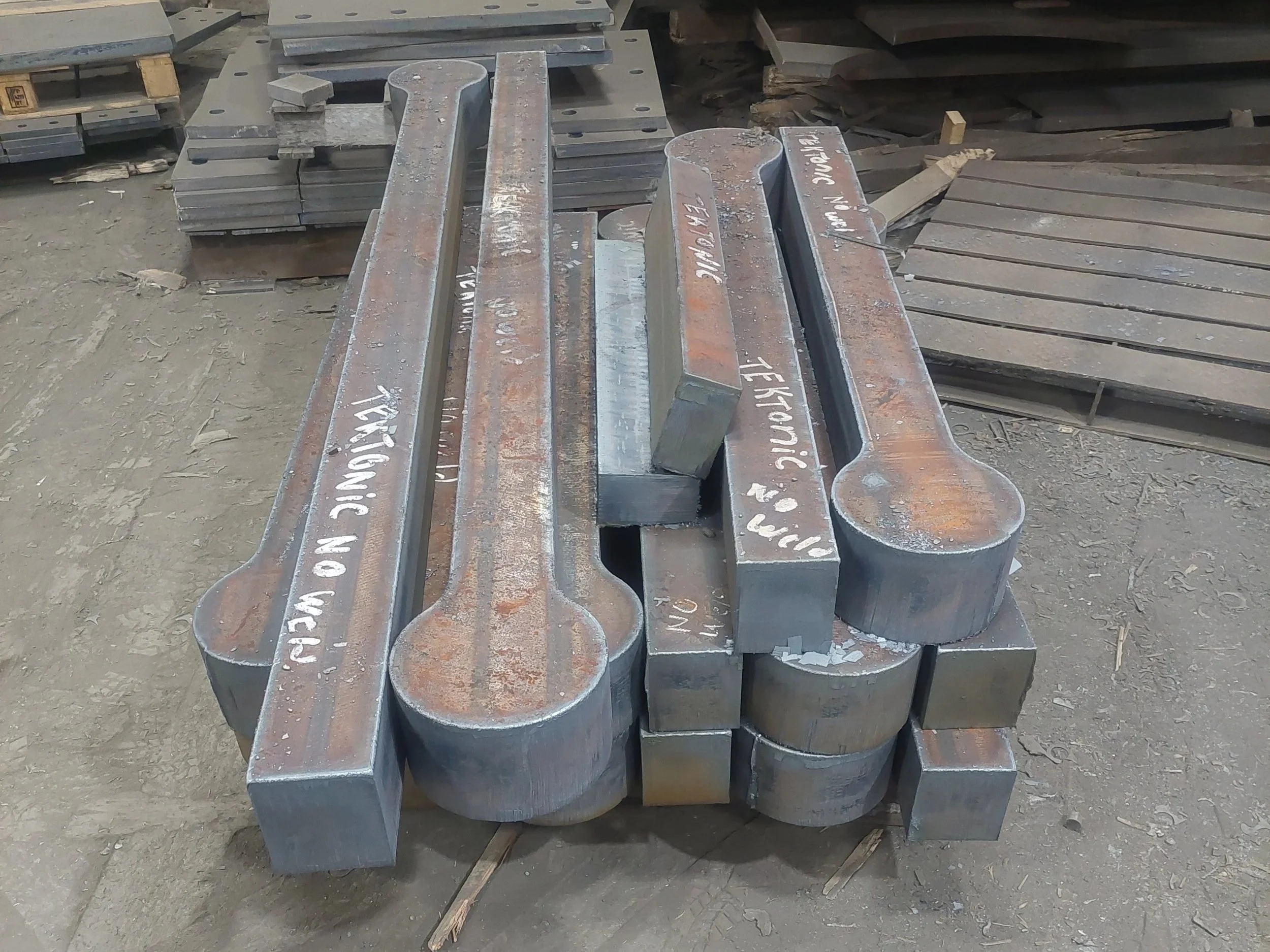 Once the flame-cut blanks were produced, they were stress-relieved and straightened before we machined them to 1/4 inch thicker than that of the finished blank you will see in the next slide.