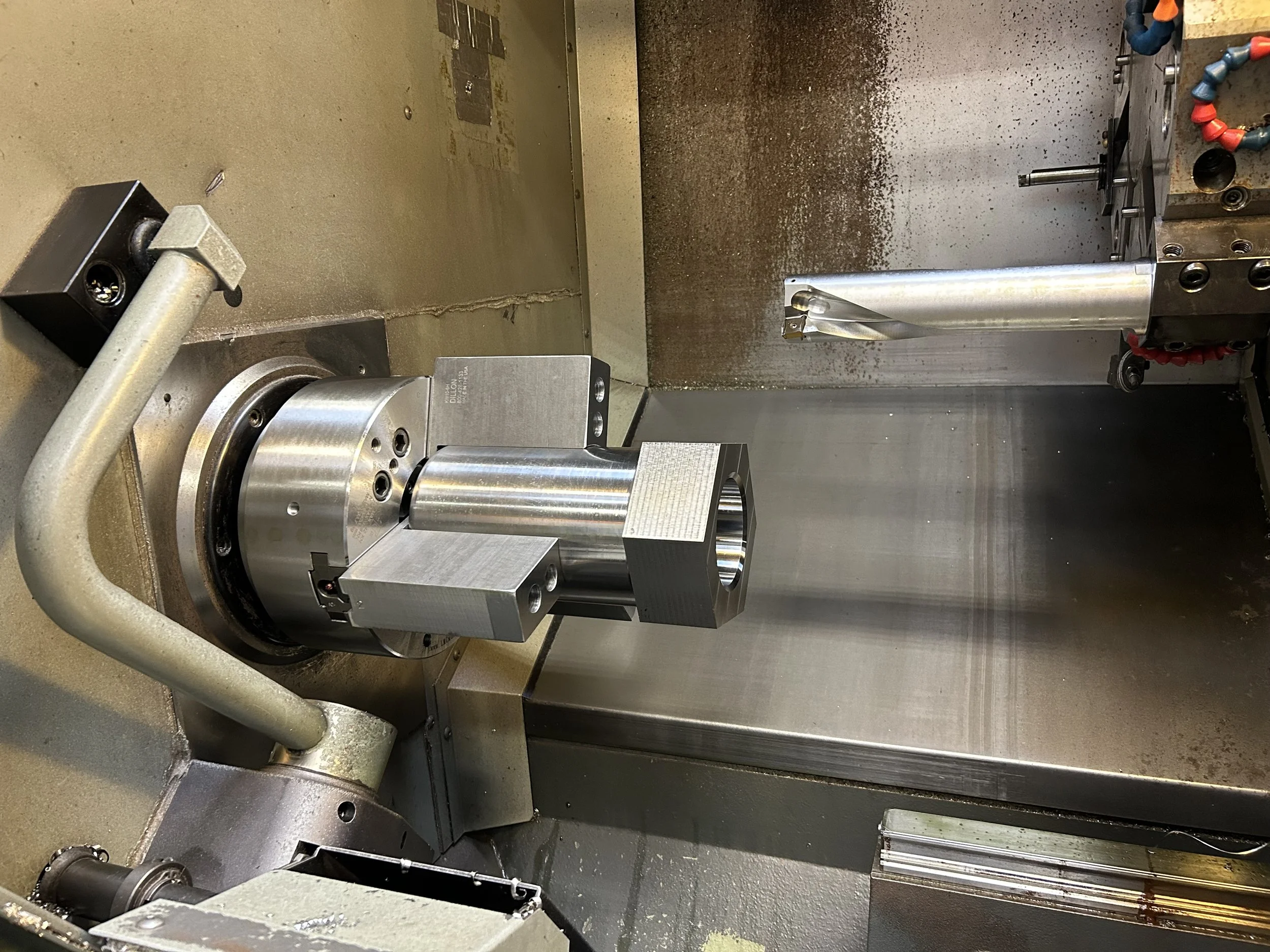 Shown here is the 2 1/2 inch diameter inserted drill, which did the bulk of the interior material removal before boring.