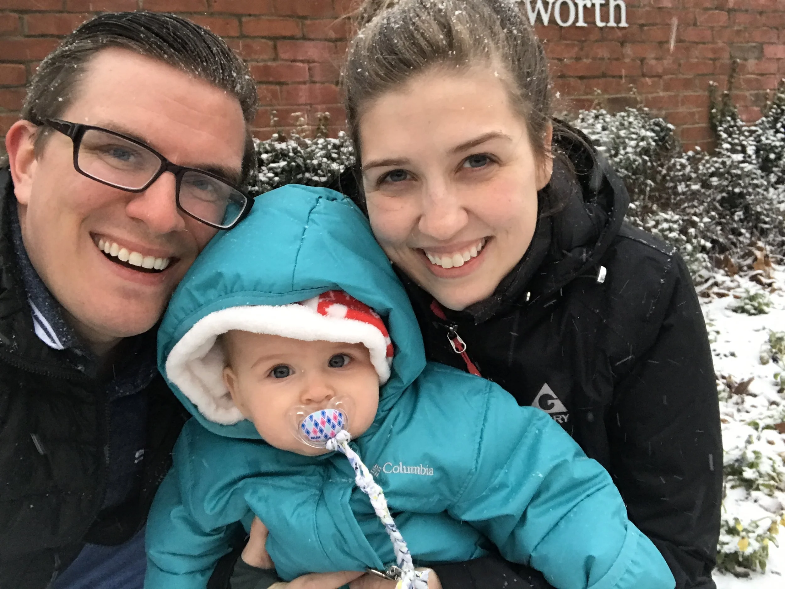 Nick and Lauren enjoy some rare Nashville snow with their daughter.