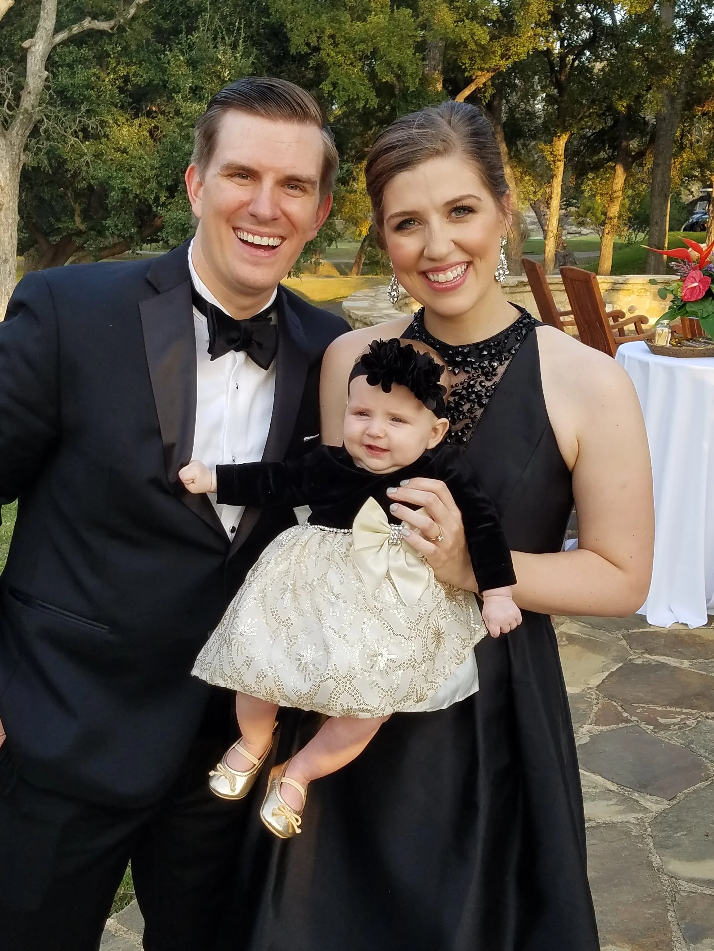 Nick's family celebrates at a wedding.