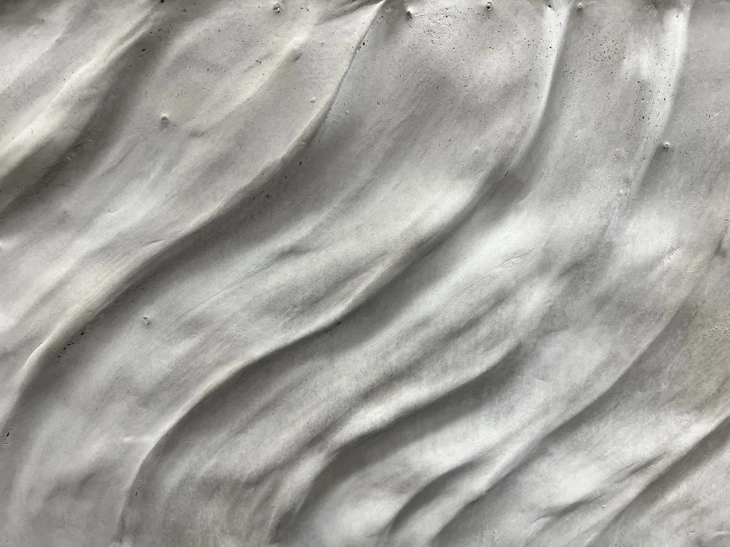 The waves against the shore