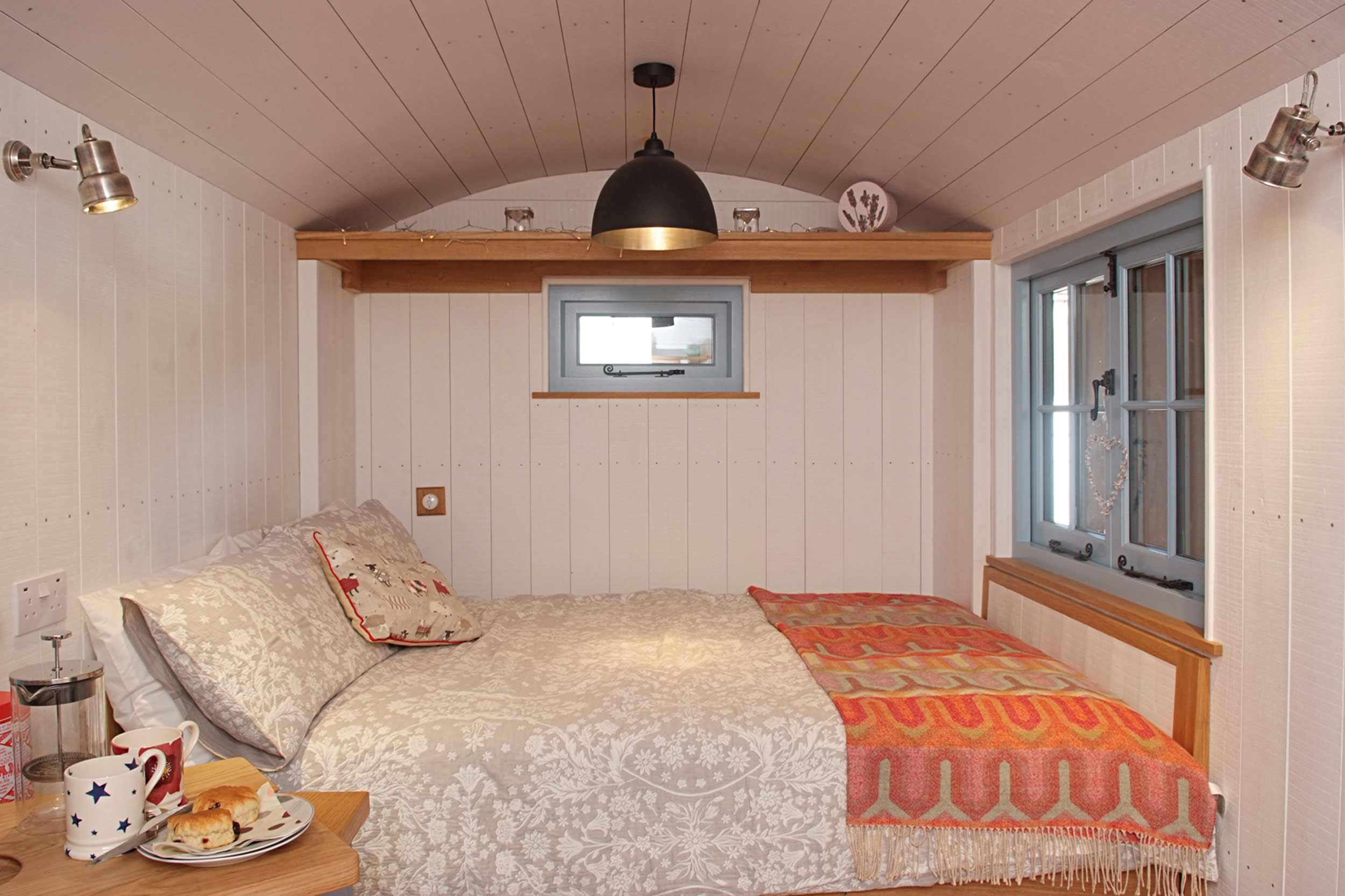 Shepherds Hut Bedroom End with Luxurious Fold Down Double Bed
