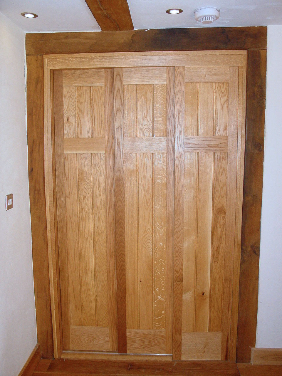 Oak Partition with Sliding Doors