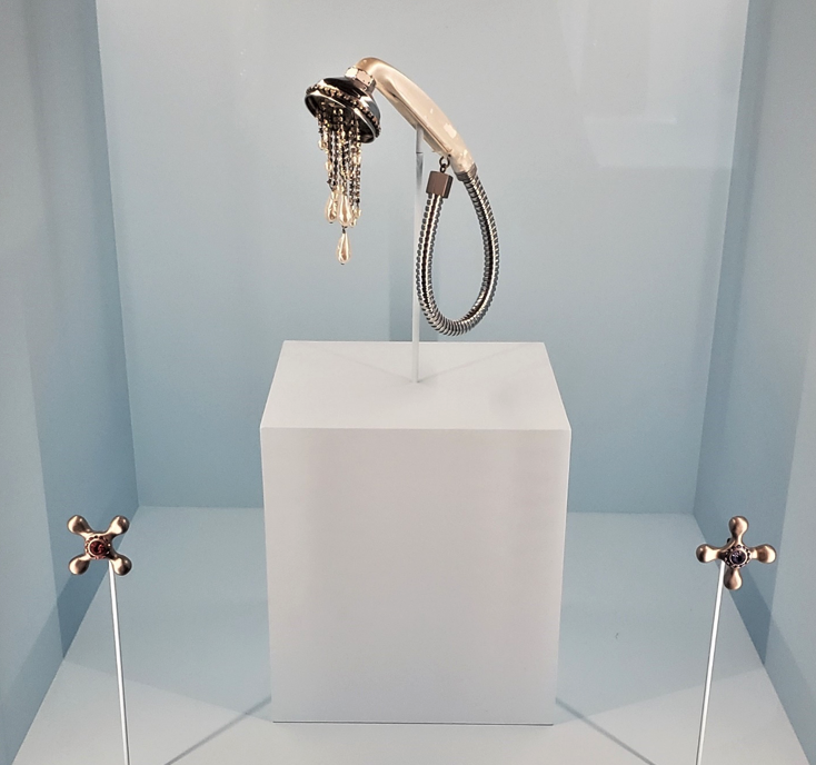 Karl Lagerfeld for Chloe showerhead necklace and knob earrings.