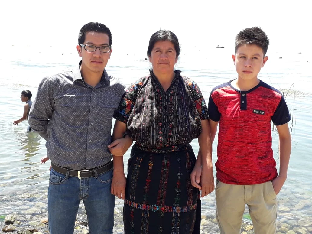 Hector with his mom and younger brother.
