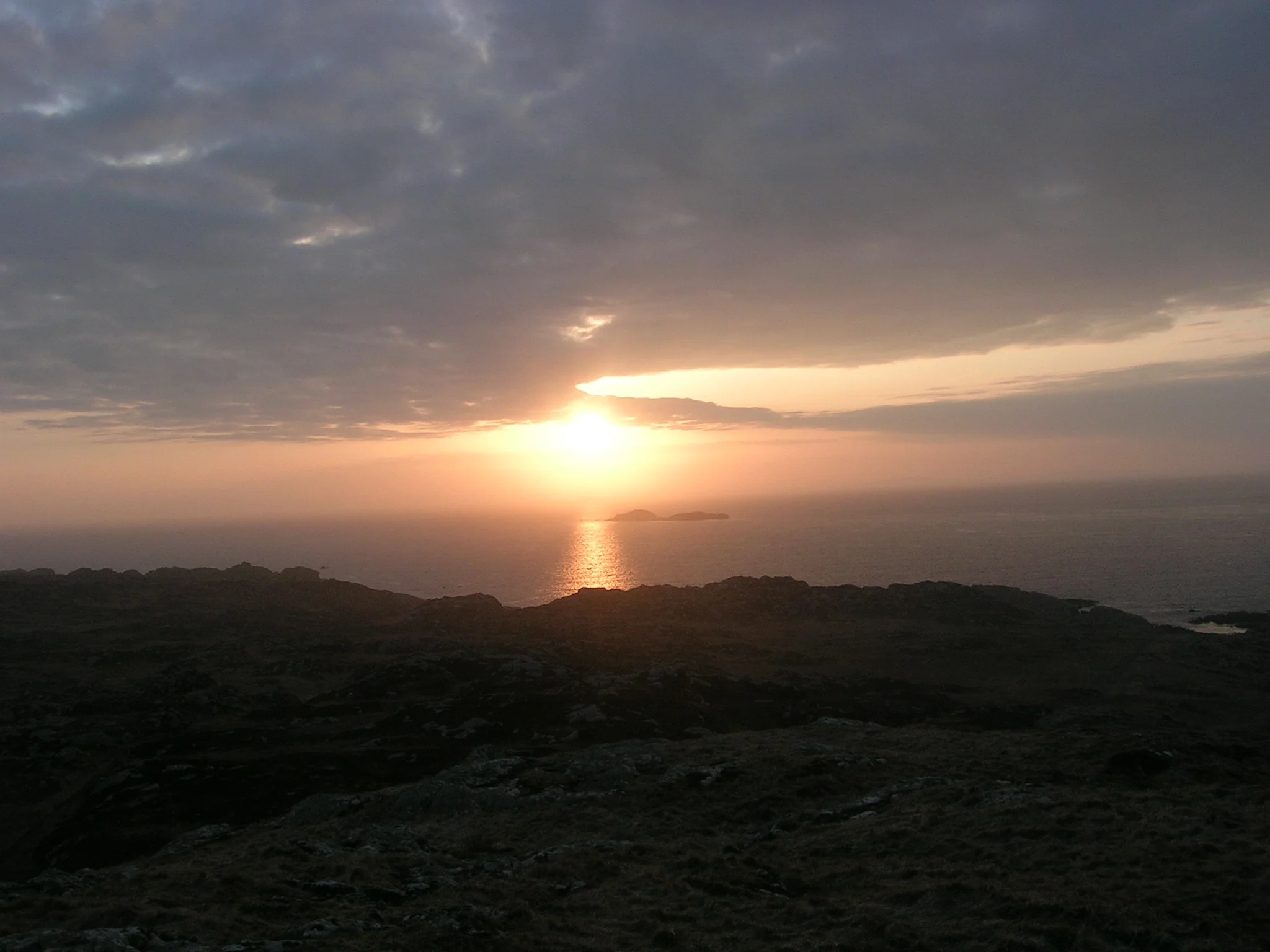{This photo is one I took in 2007 when my husband and I traveled to Scotland. On the Isle of Iona, I climbed this hill, passing sheep along the way, and alone with the Lord, sat and watched the sunset one evening during Holy Week.}