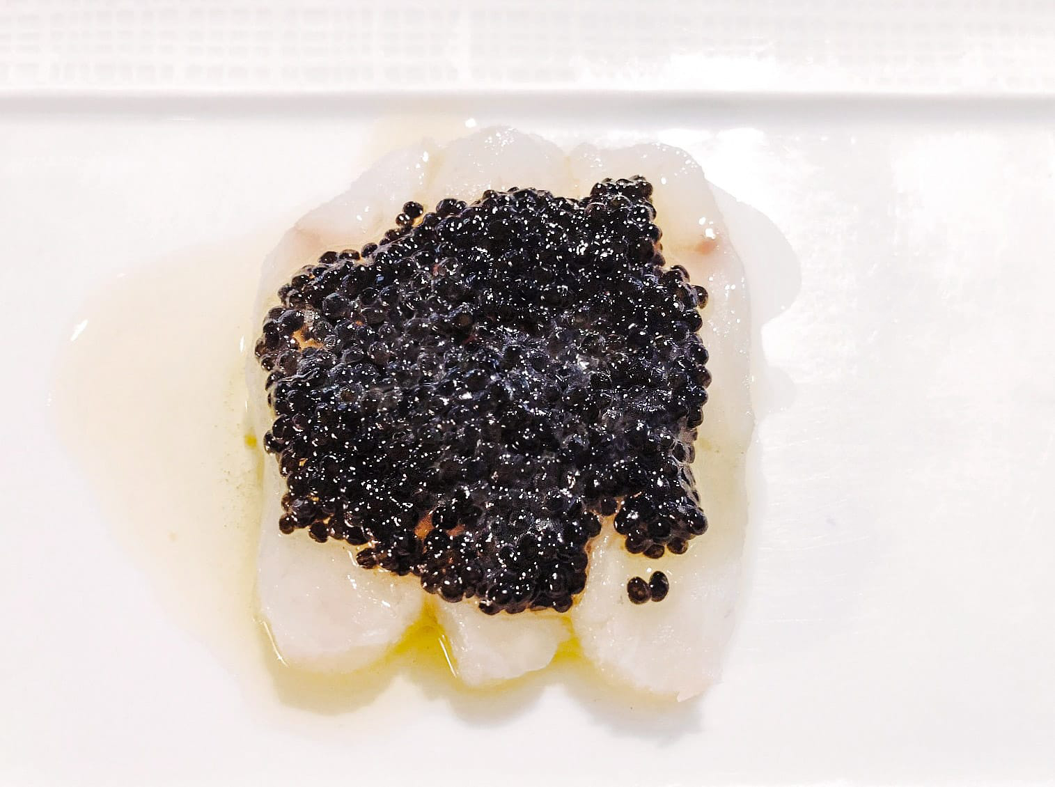 Crudo e Caviale - fluke crudo, american sturgeon caviar crème fraîche, meyer lemon