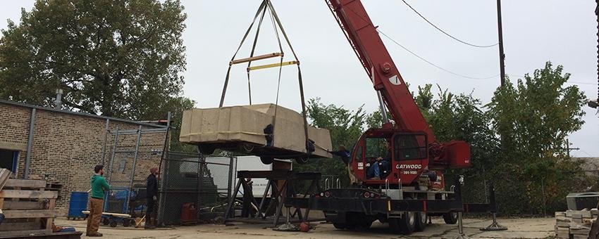   Wolf Vostell’s Concrete Traffic being raised for conservation work on the northwest side of Chicago.  