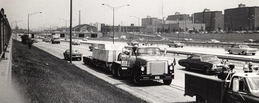    David Katzive, view of Wolf Vostell’s Concrete Traffic as it moves down I-90 to the University of Chicago, June 1970. (Collection of the Museum of Contemporary Art Chicago. Photo © MCA Chicago.)   