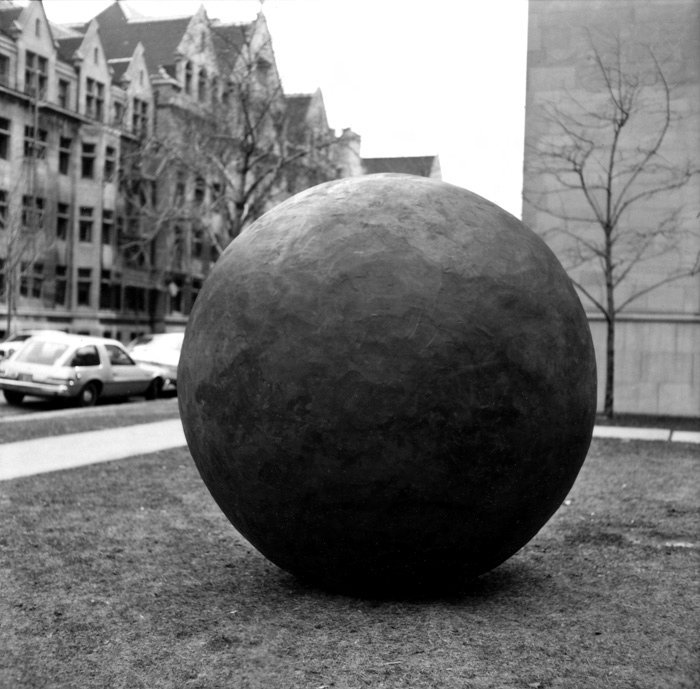 Photograph of Black Sphere's original campus siting, 1980