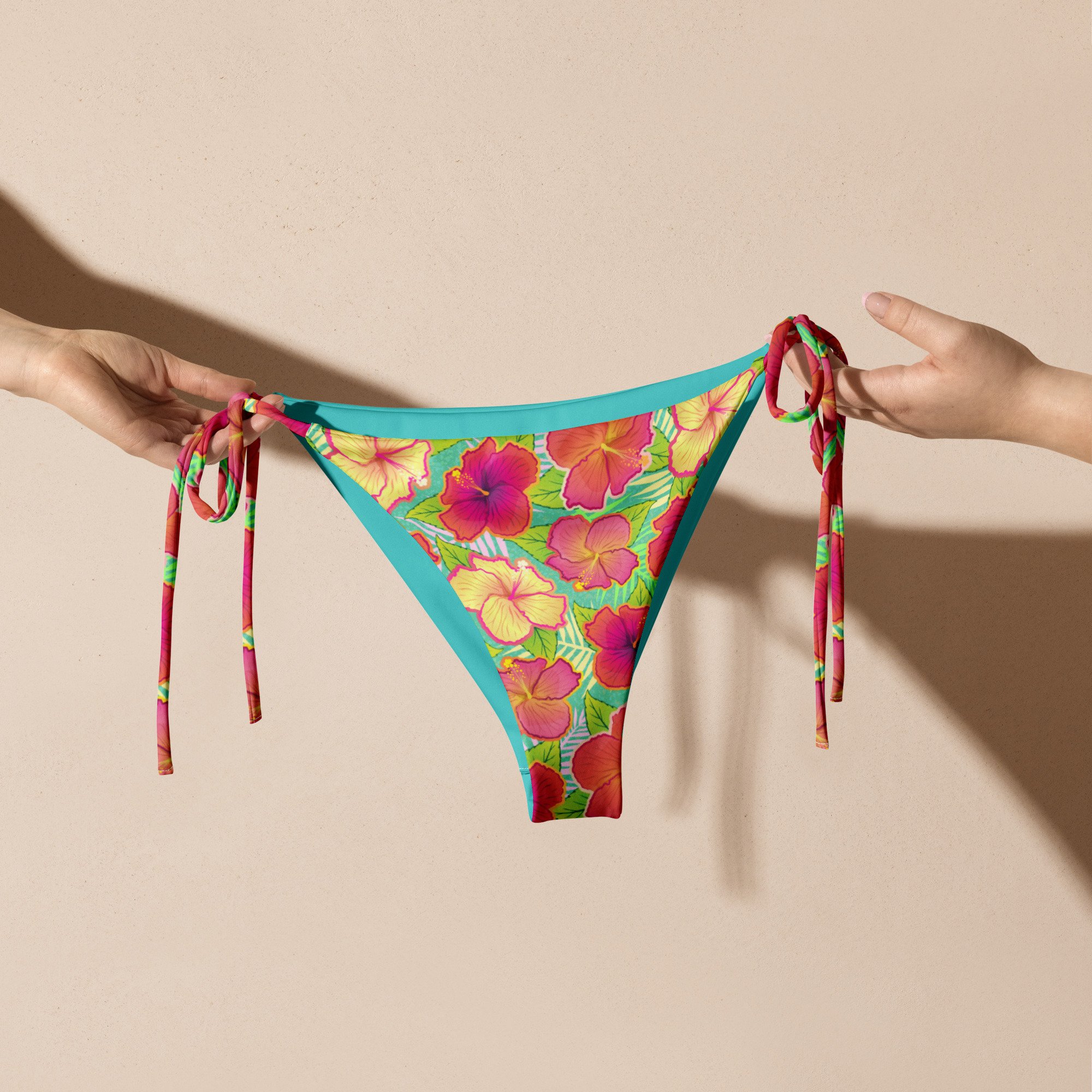 all-over-print-recycled-string-bikini-bottom-white-front-663548e45b5ab.jpg