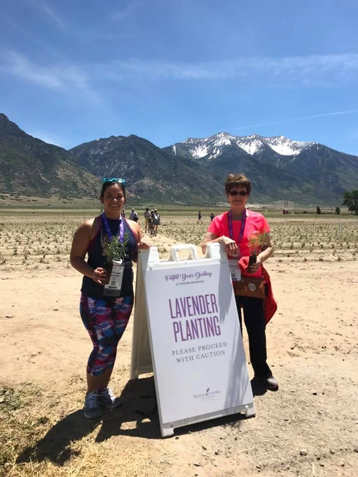 Adorina and Evelyne at the Young Living Lavender Farm in Mona, Utah planting lavender on June 15, 2017.