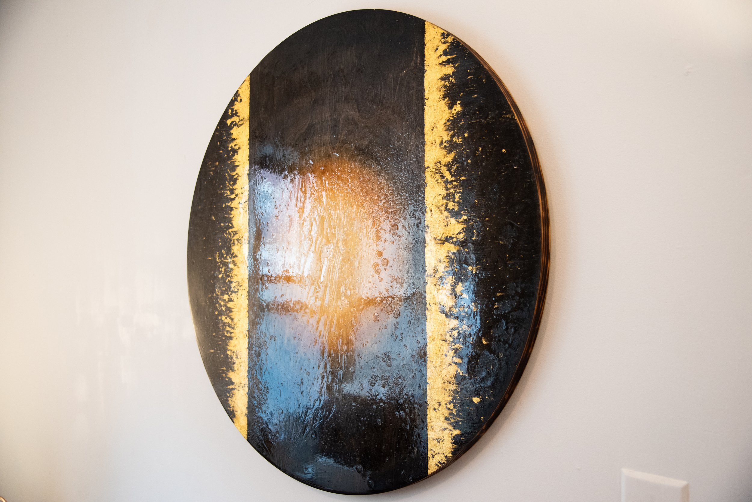  blood density [rich soil] 2021 oil paint, flame, mica, 24k gold and resin on birch 36” round (sold) 