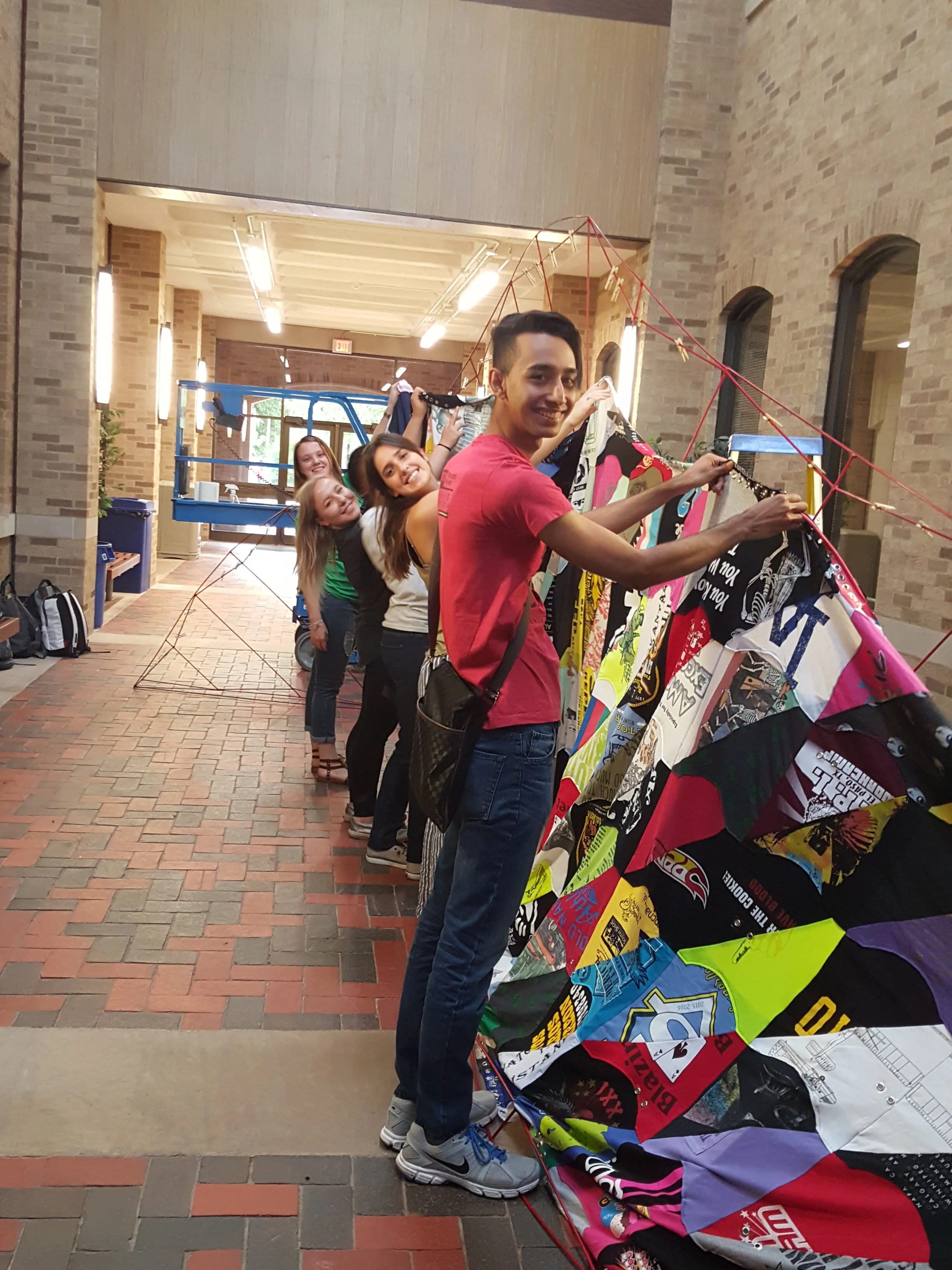 Working with students on Ismael de Anda III art installation TTU College of Human Sciences.jpg
