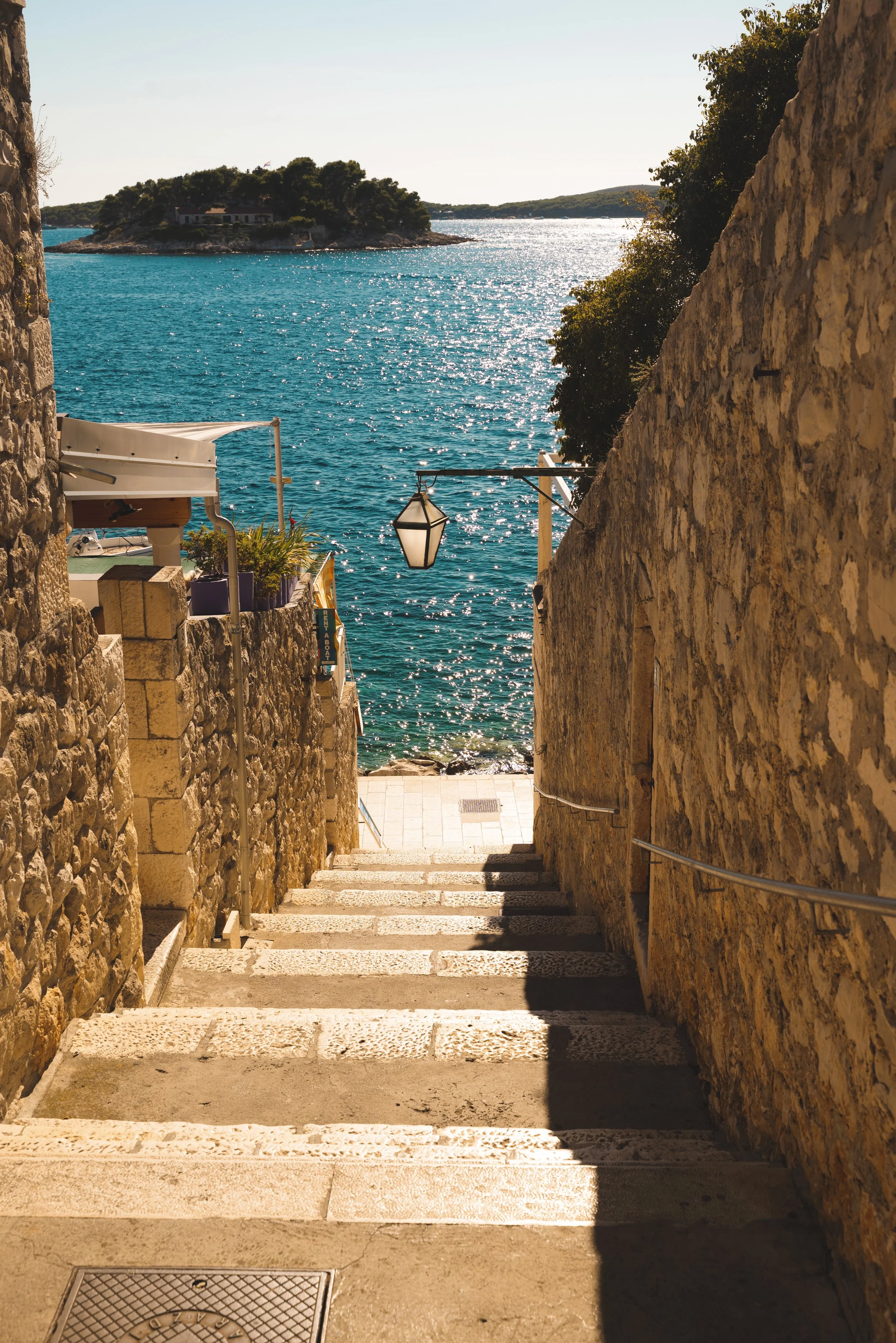 steps in hvar town leading to sea