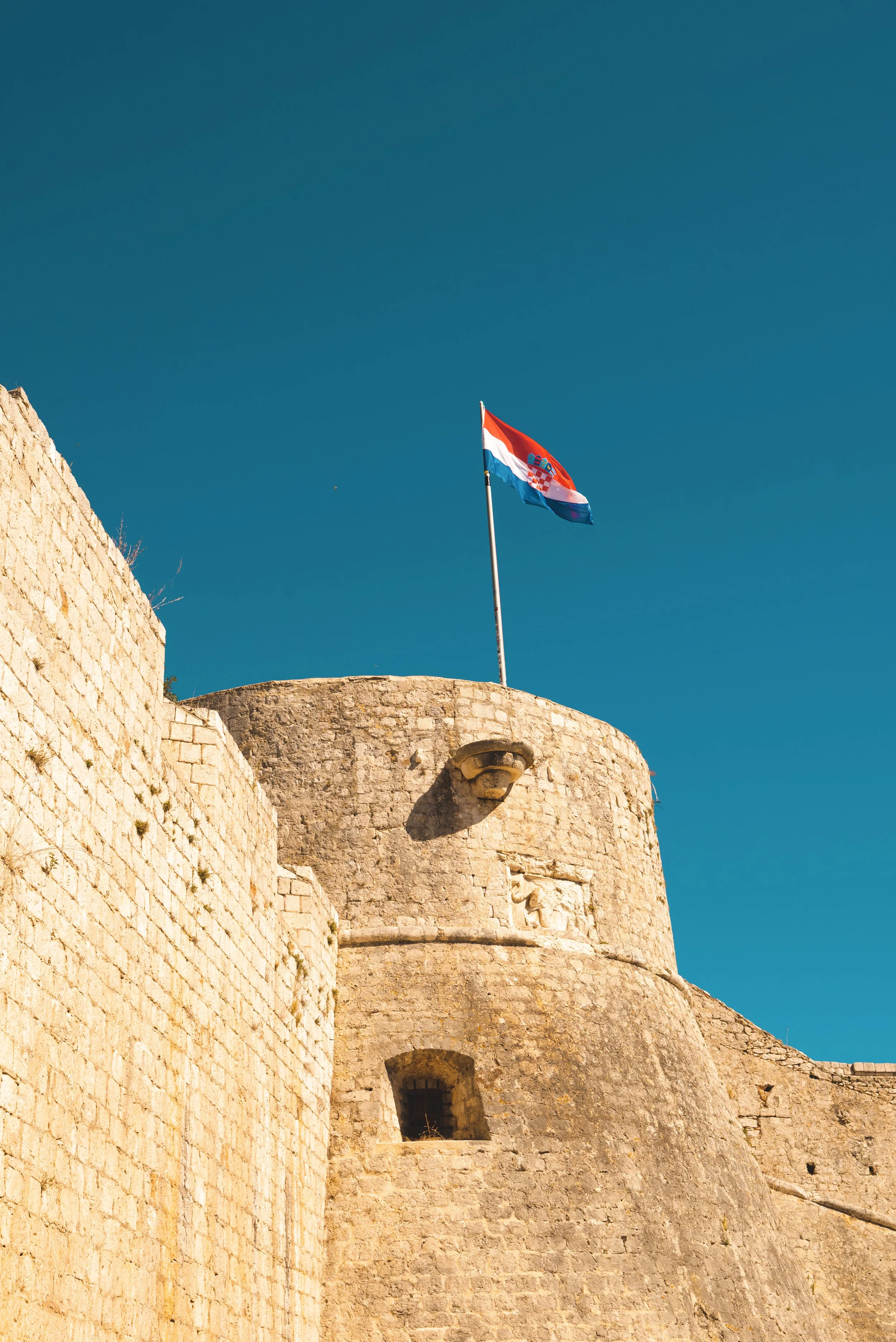 croatia flag waving on top of spanish fortress hvar