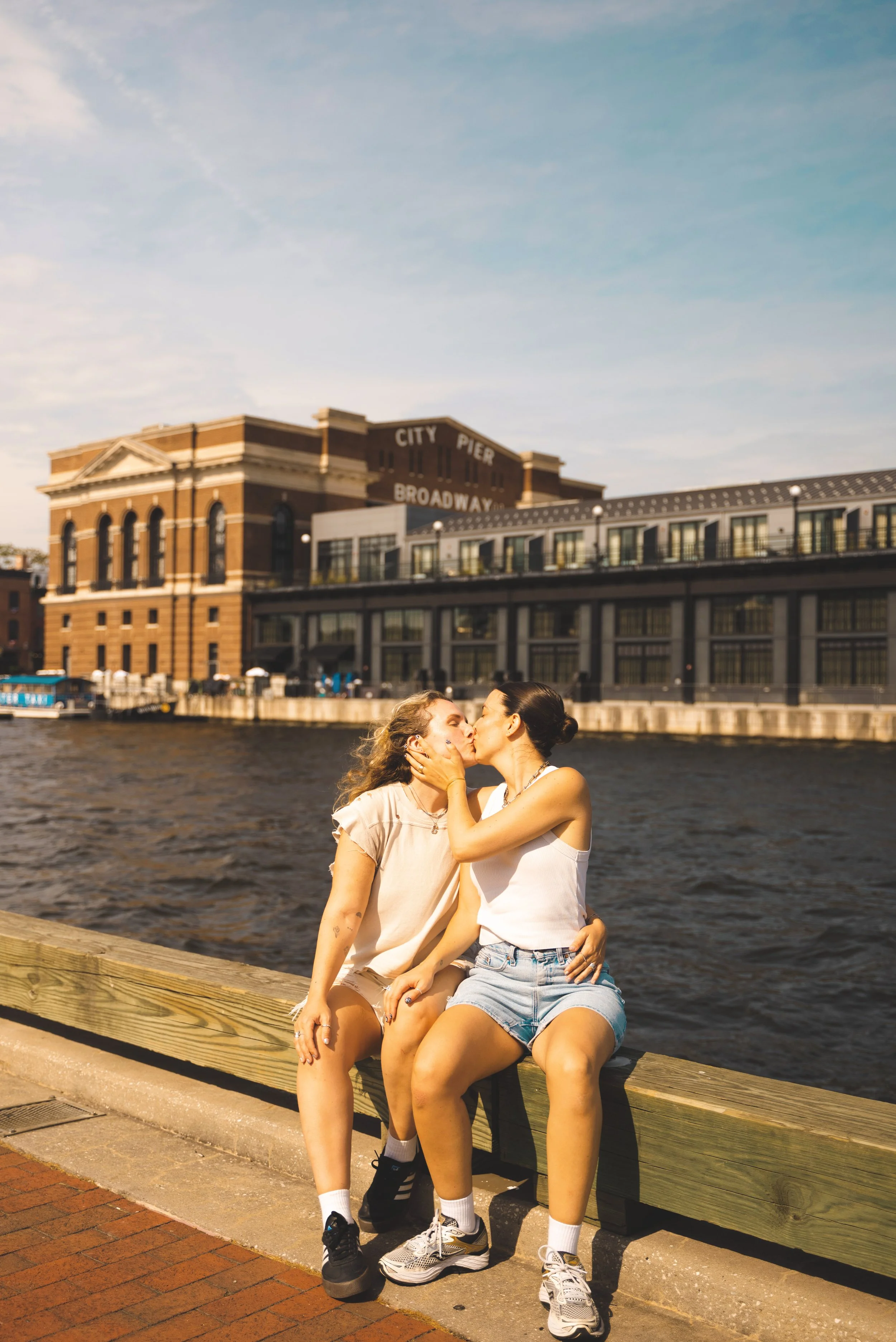two girls kissing in fell's point baltimore