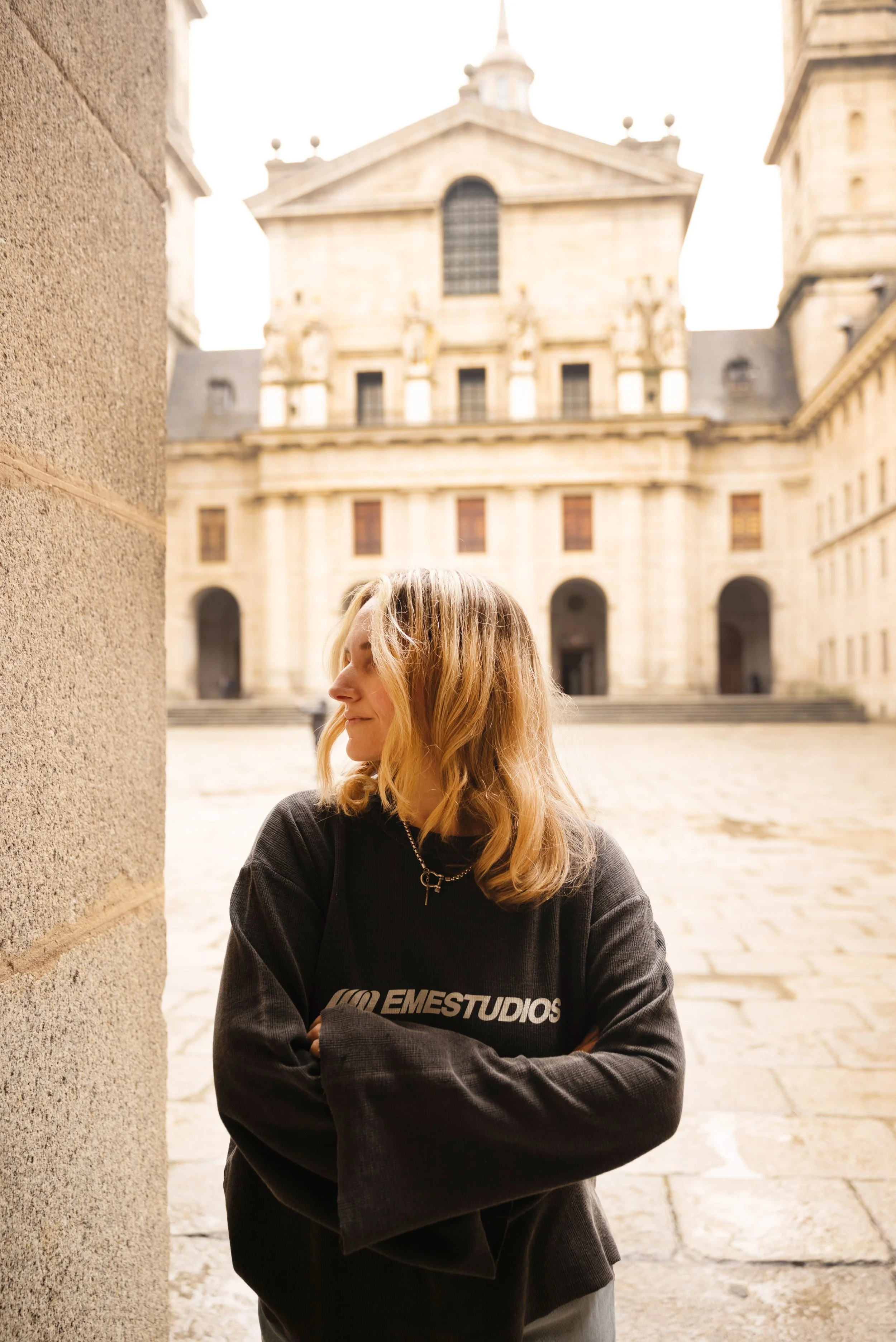 girl standing in San Lorenzo de Escorial monastery
