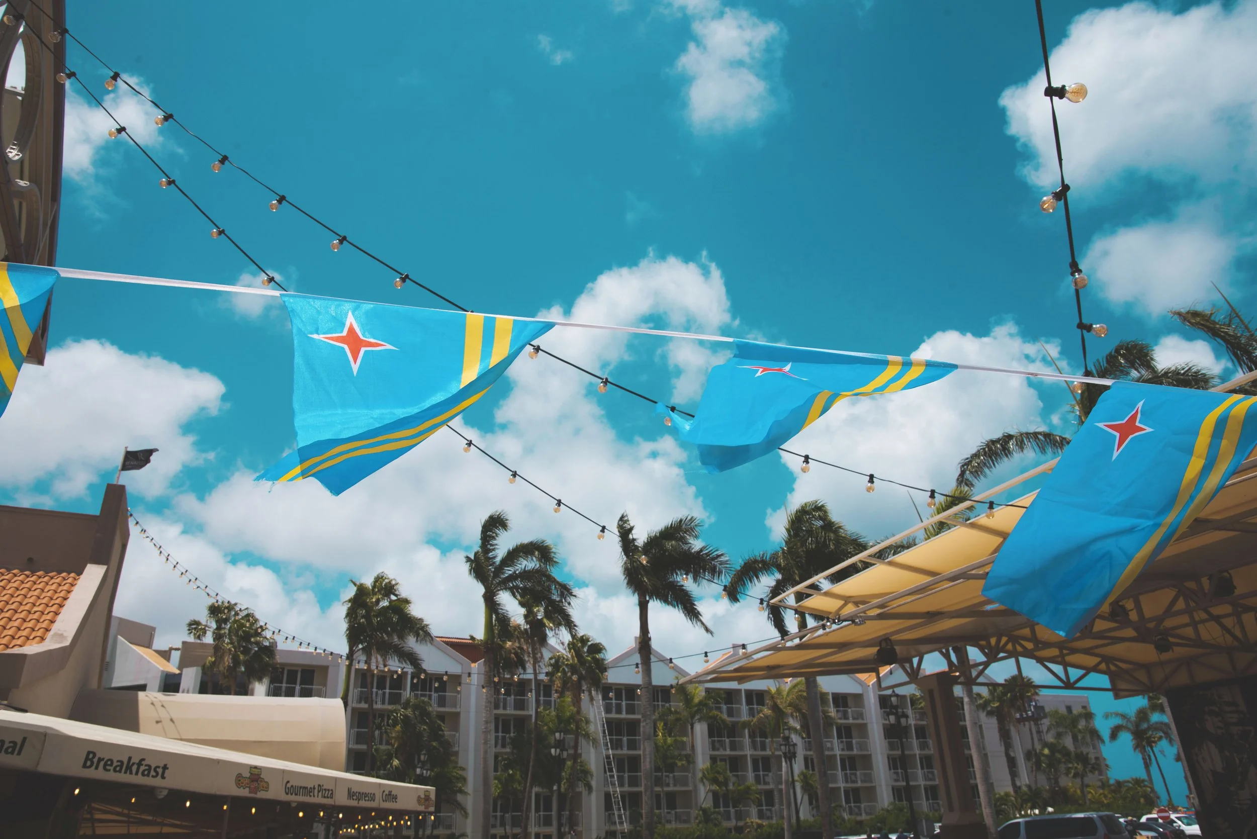 aruba flags waving in oranjestad