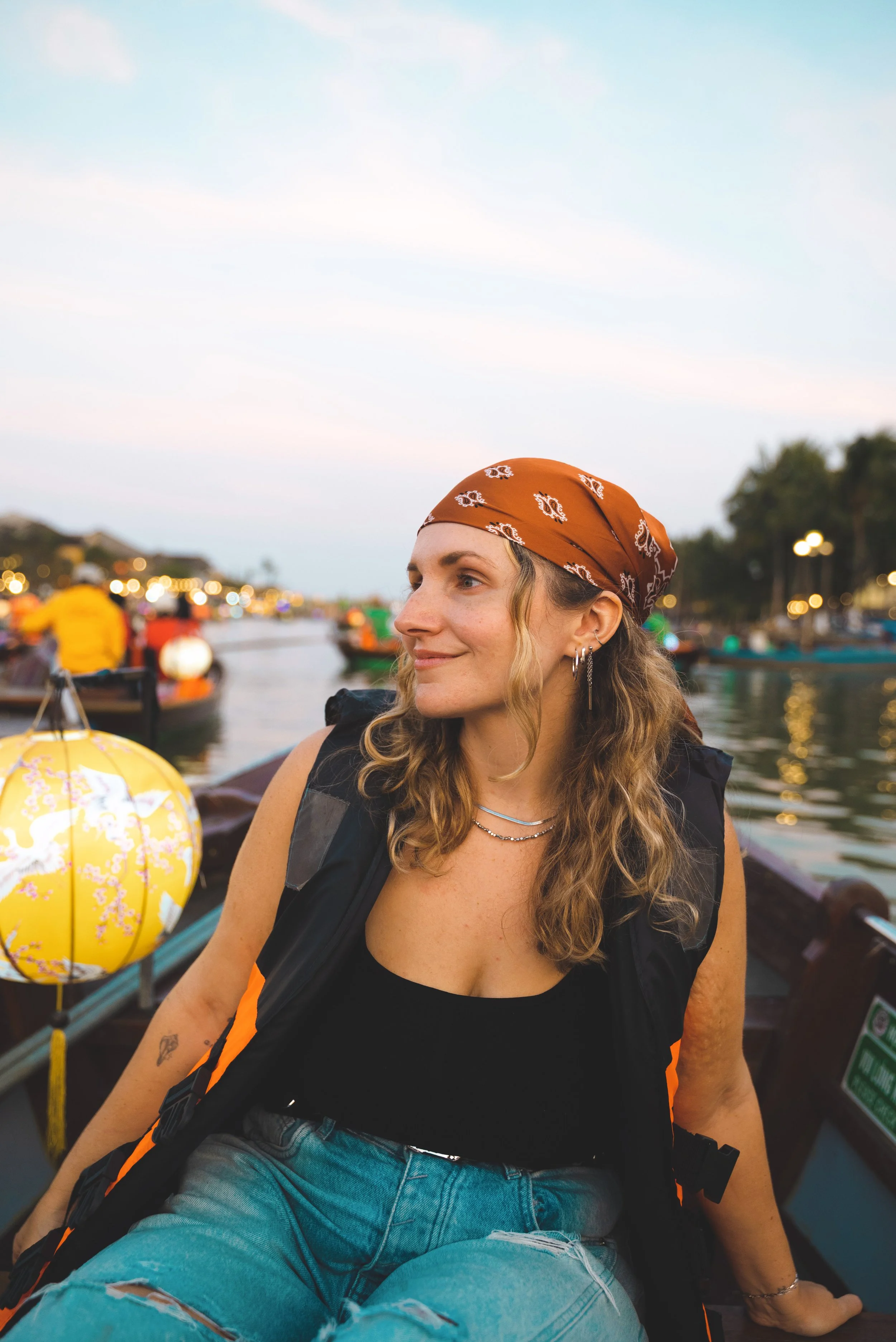girl on hoi an lantern boat ride