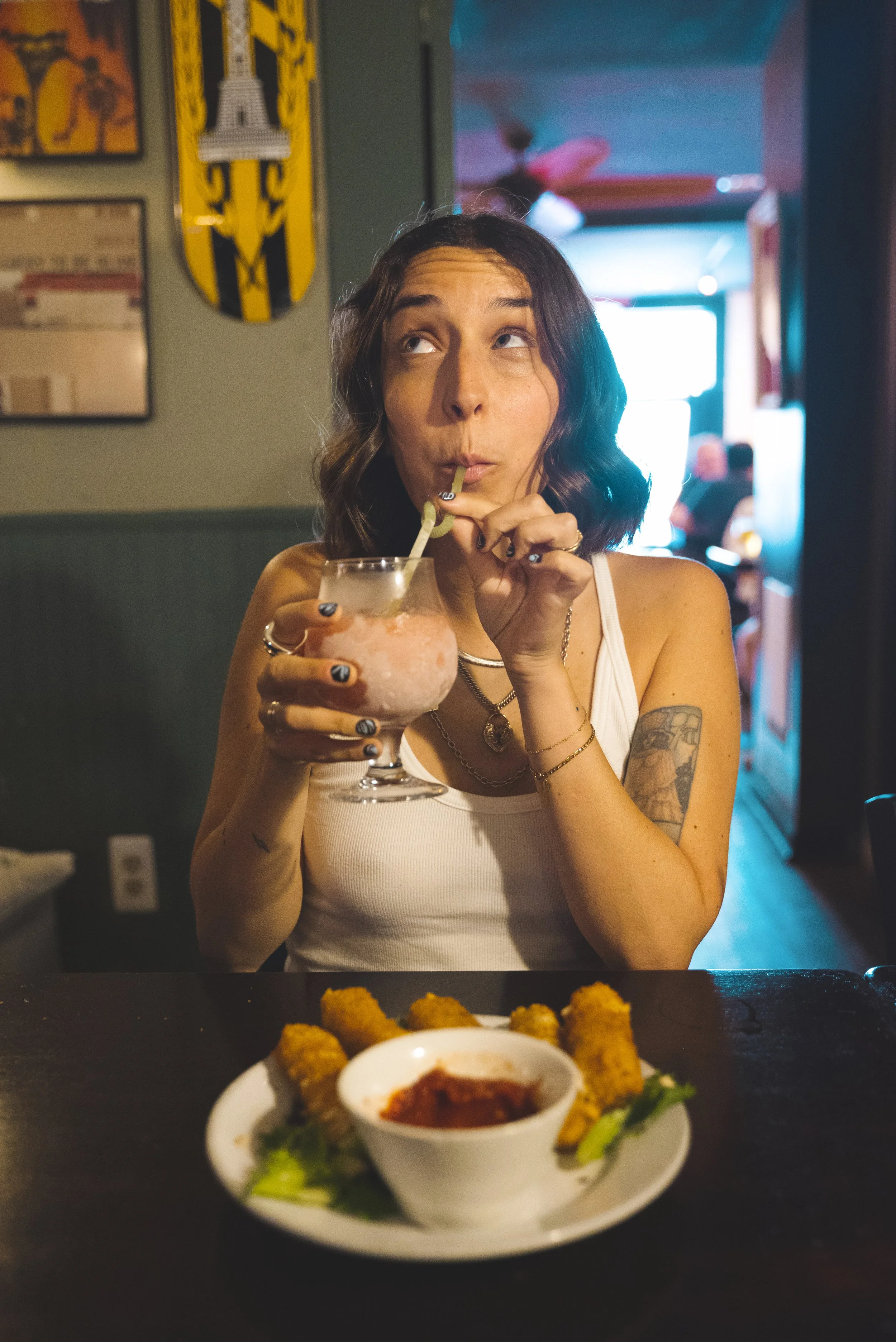 girl eating at johnny rad's baltimore