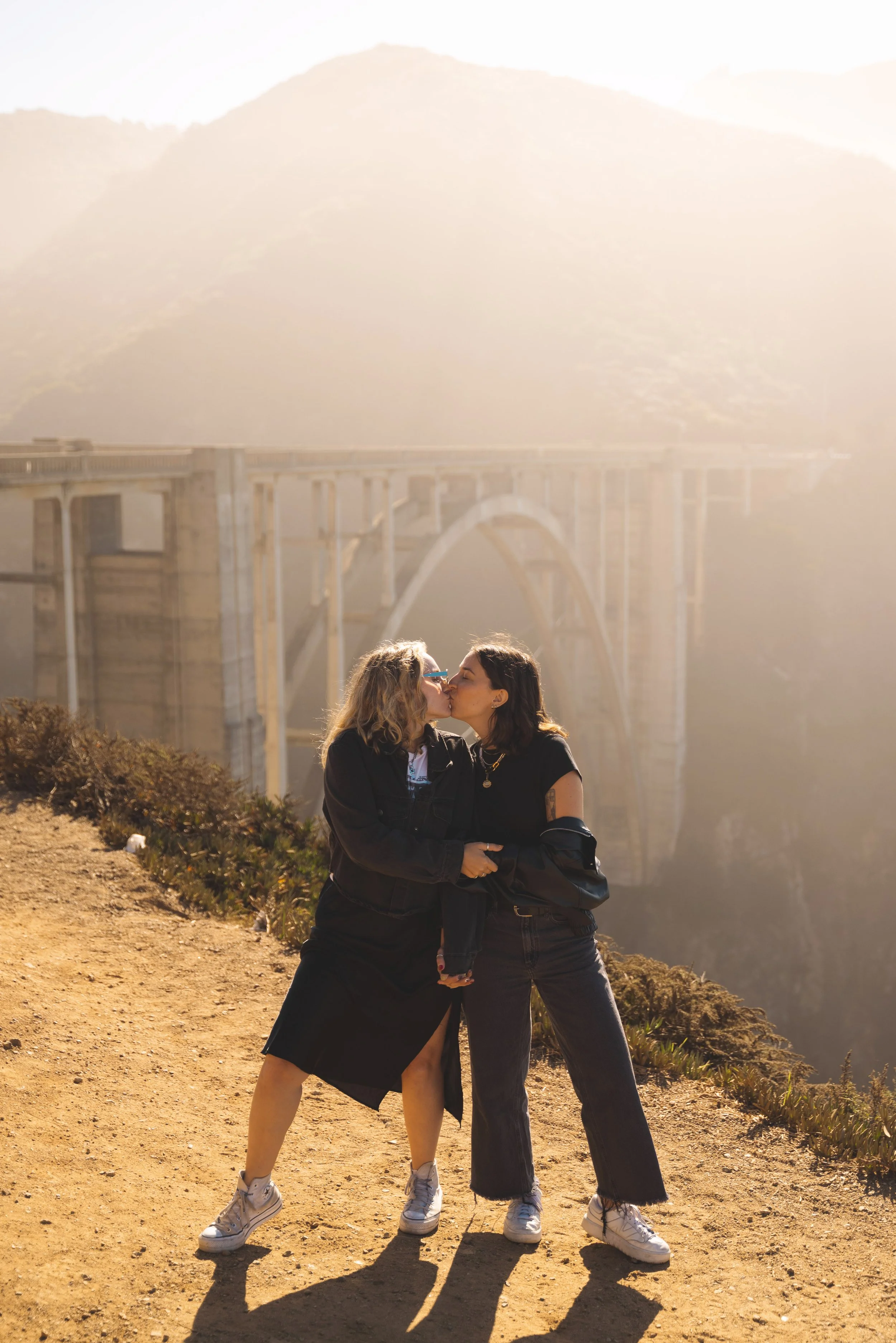two girls in front of bixby bridge california