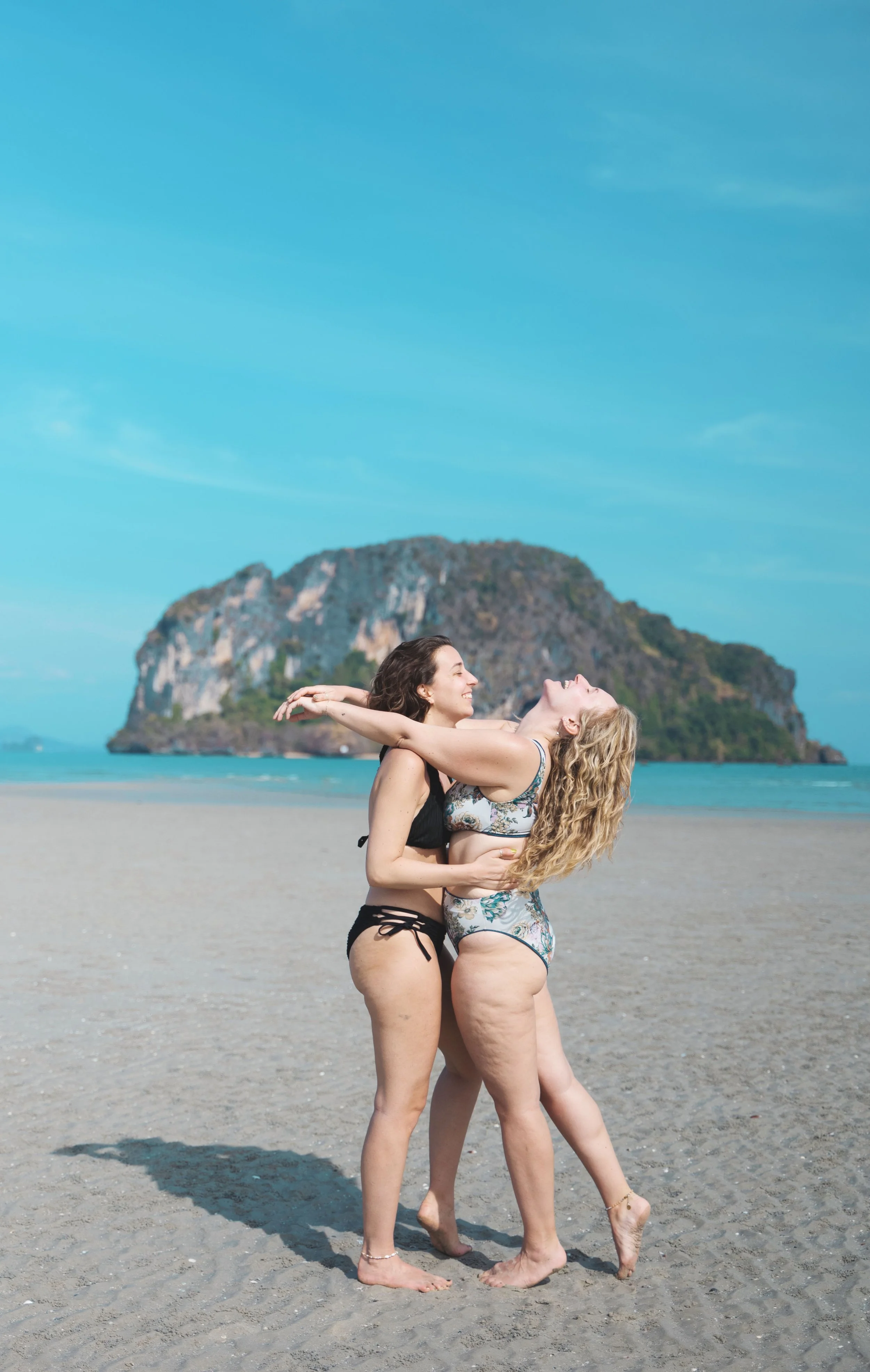 two girls hugging on hong island thailand