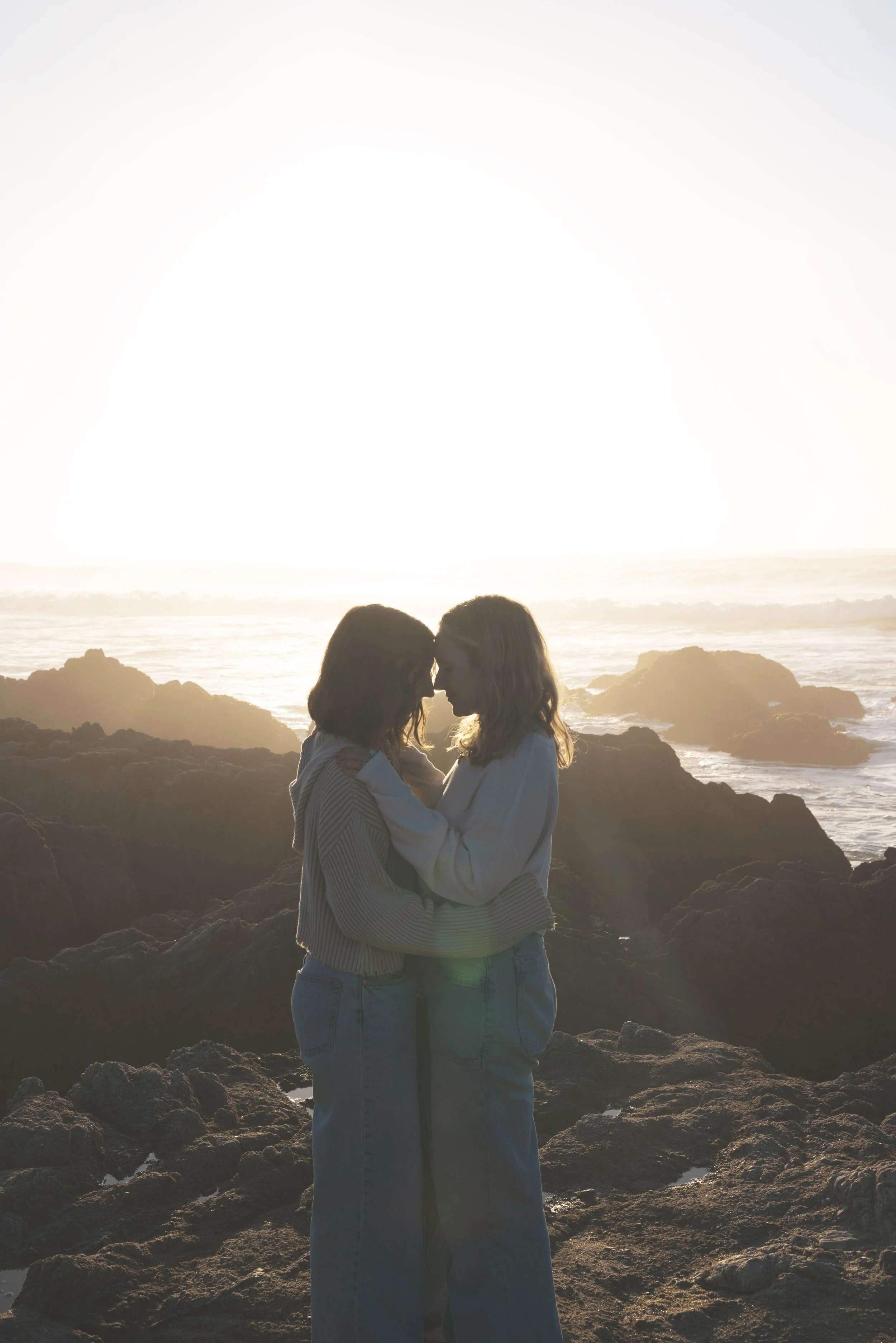two girls standing on asilomar state beach monterey