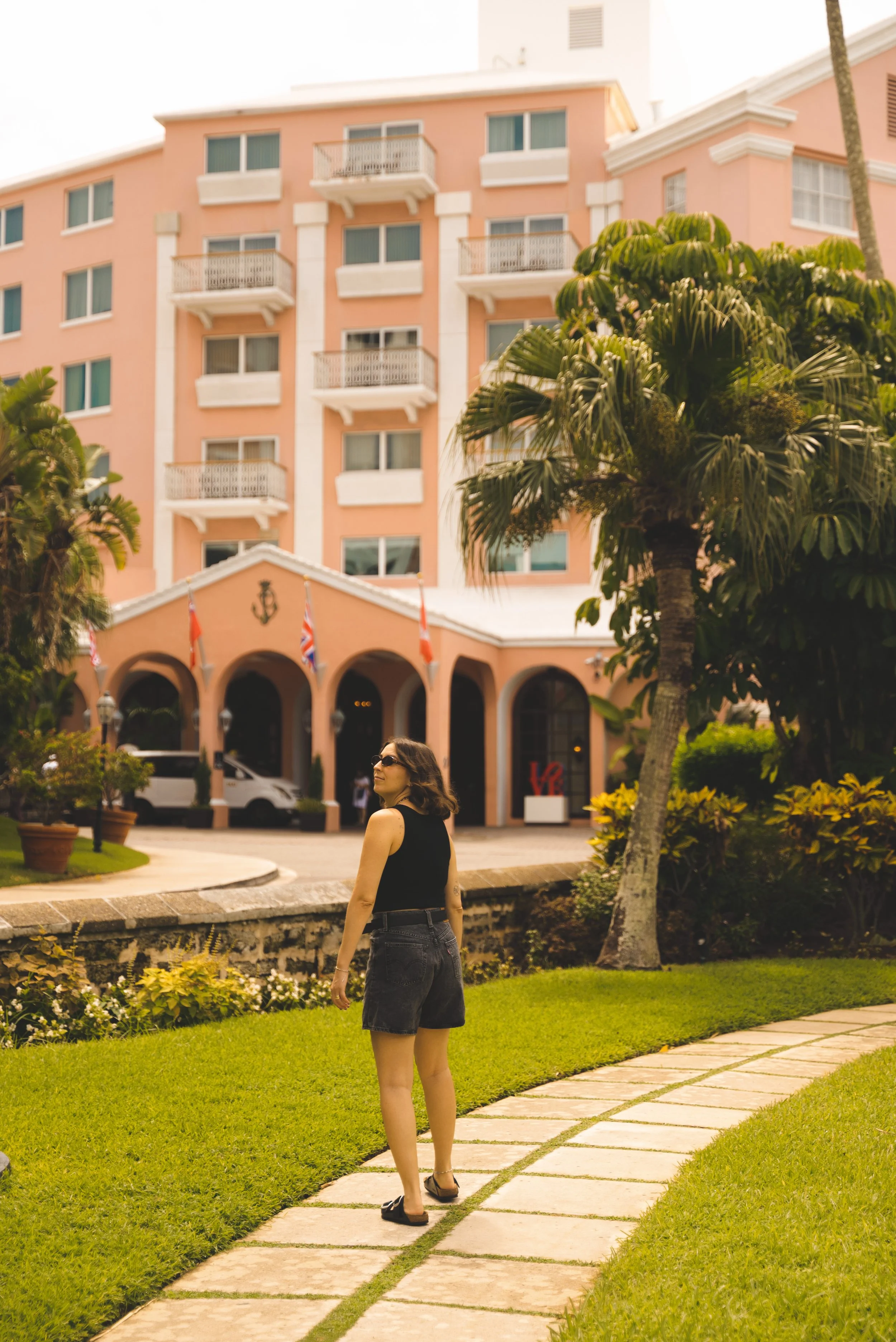 girl walking into entrance of hamilton princess bermuda