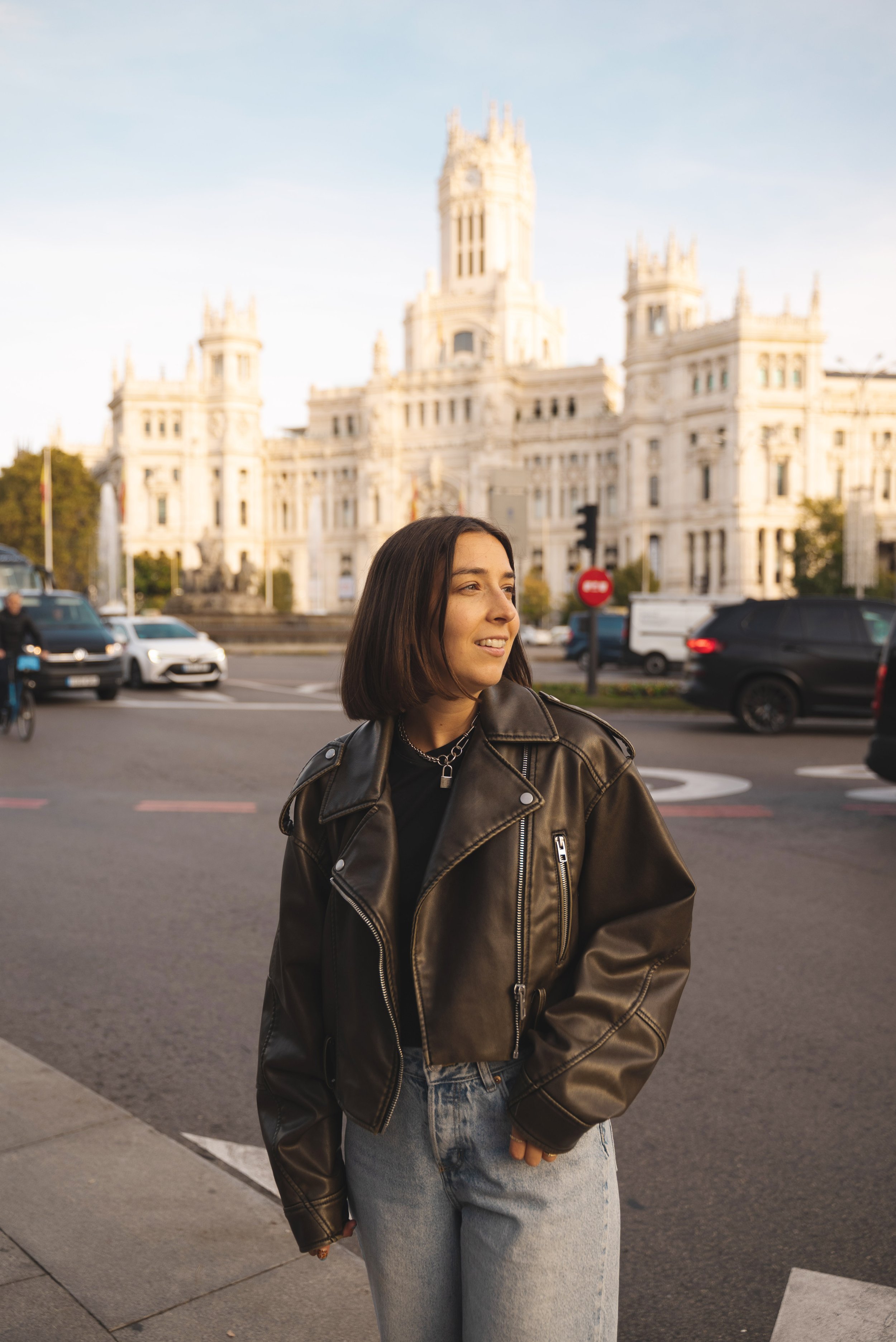 girl standing on street corner in madrid