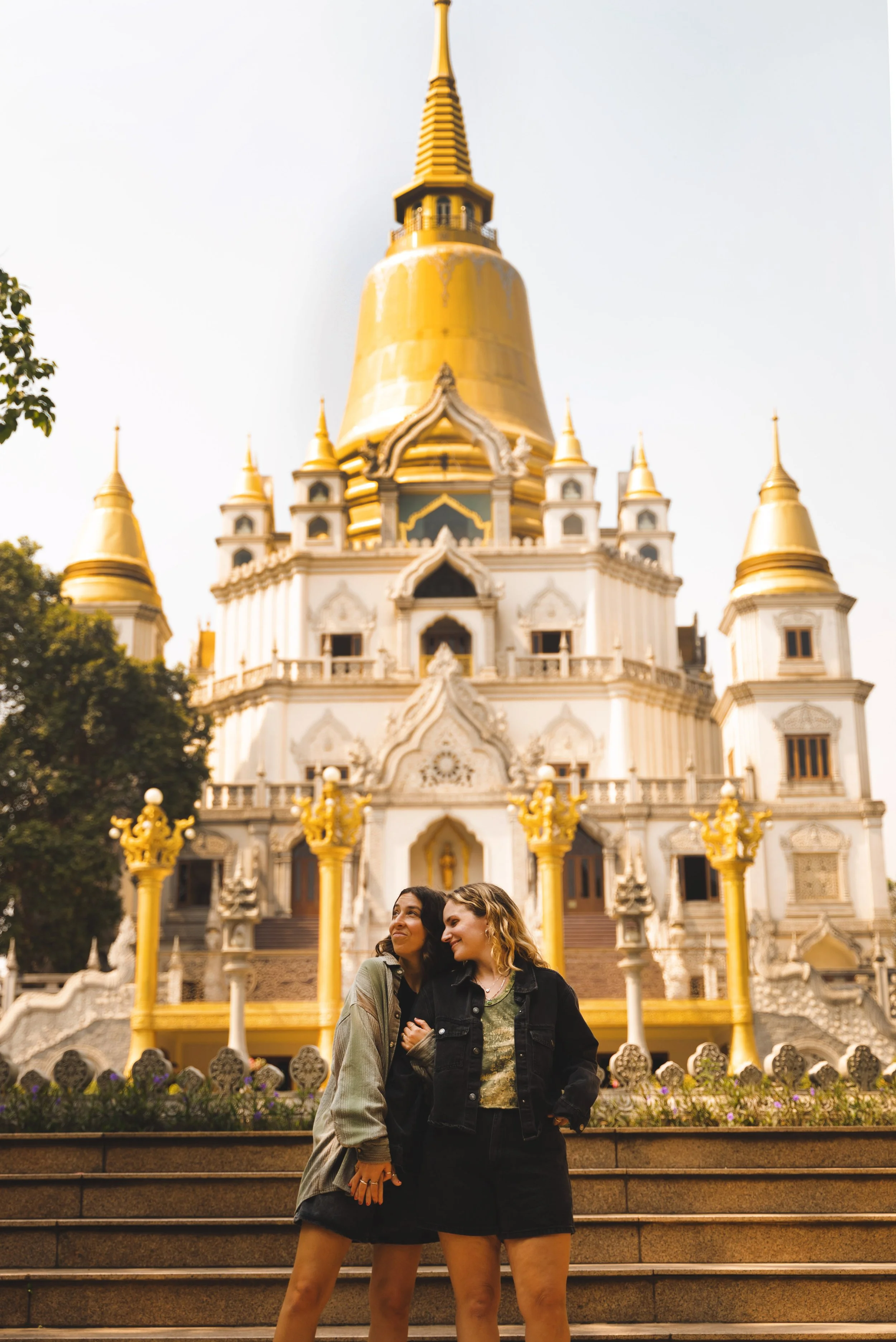 two girls in front of buu long pagoda hcmc