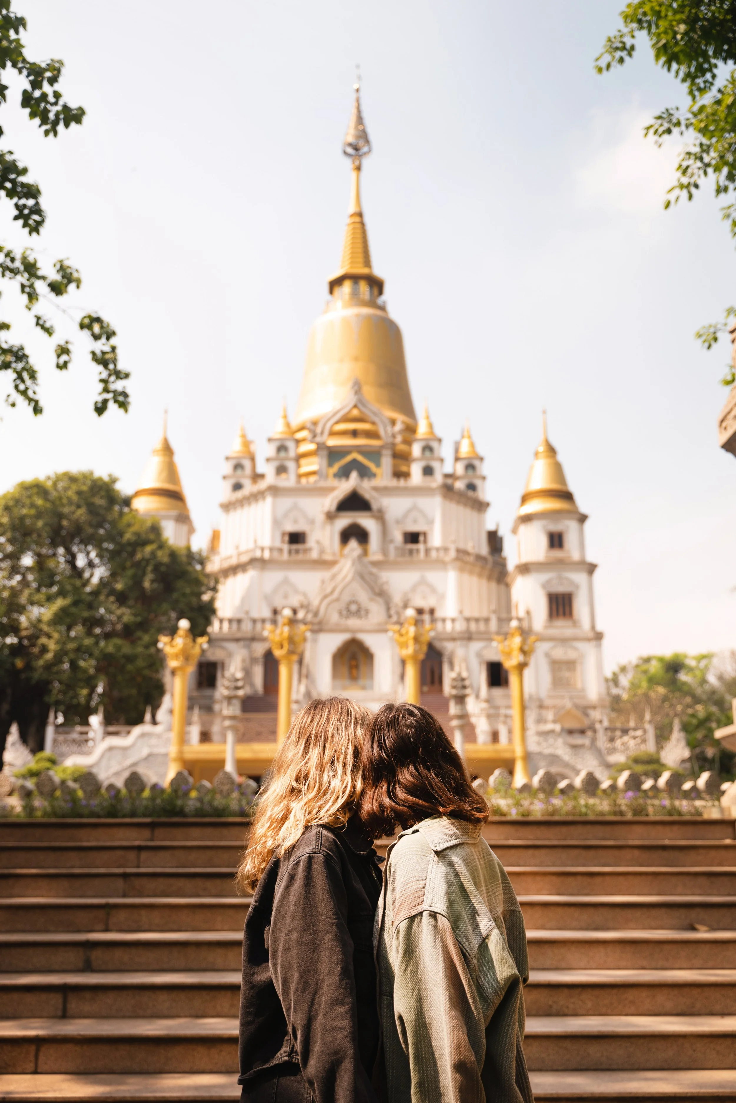 two girls looking at buu long pagoda vietnam