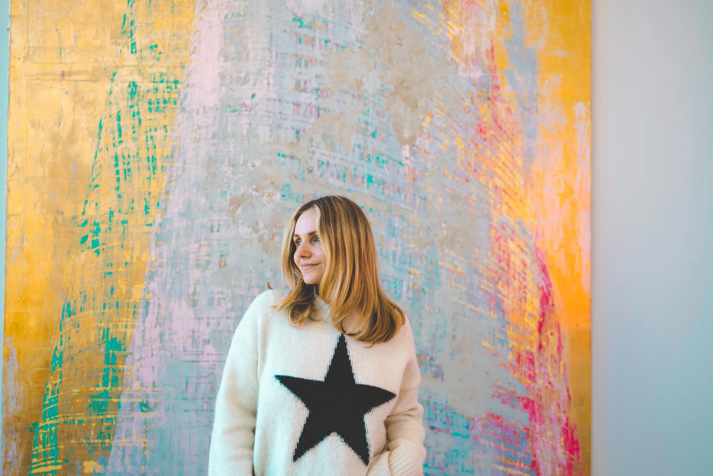 girl standing in front of painting at UMMA ann arbor