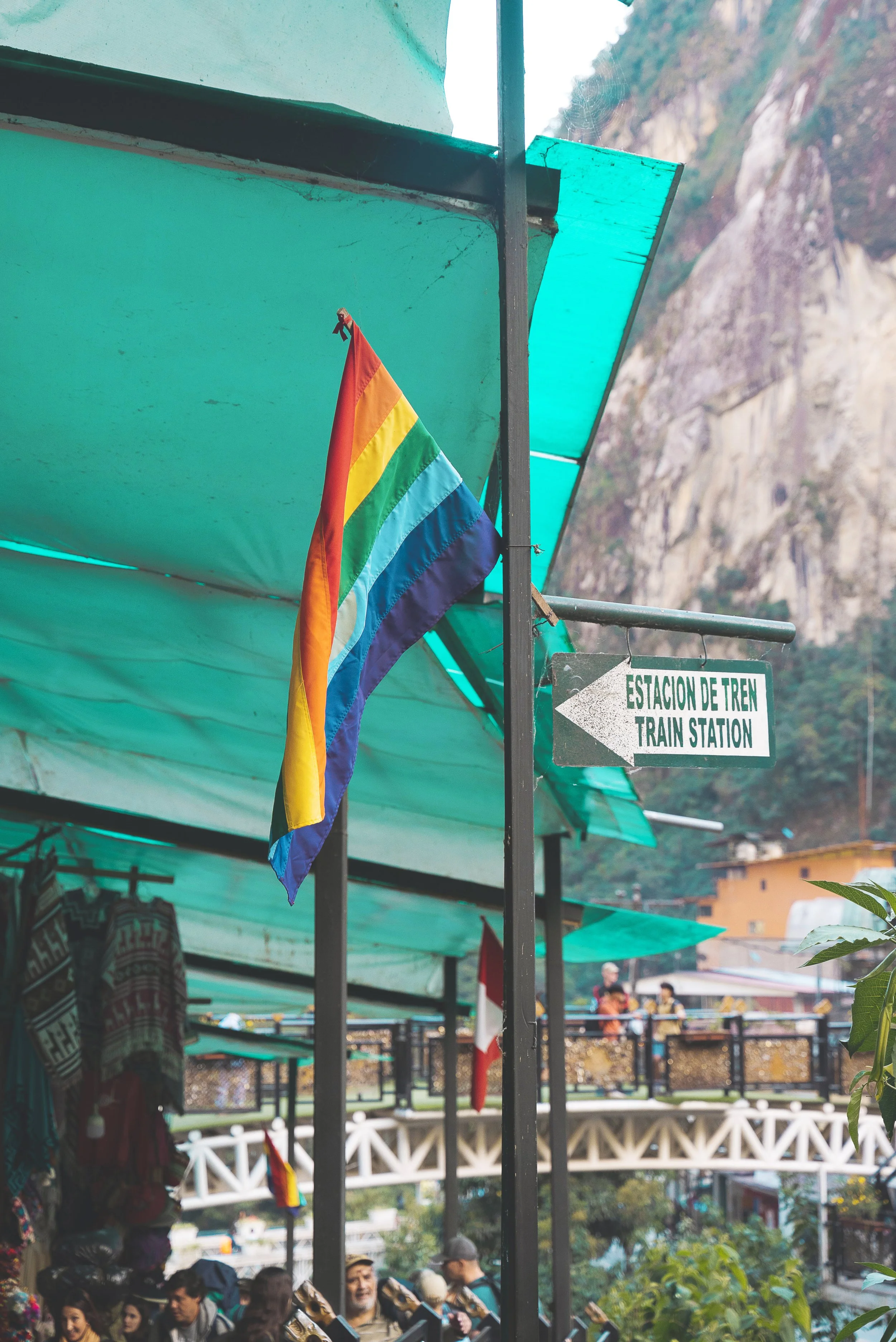 cusco flag in machu picchu pueblo peru