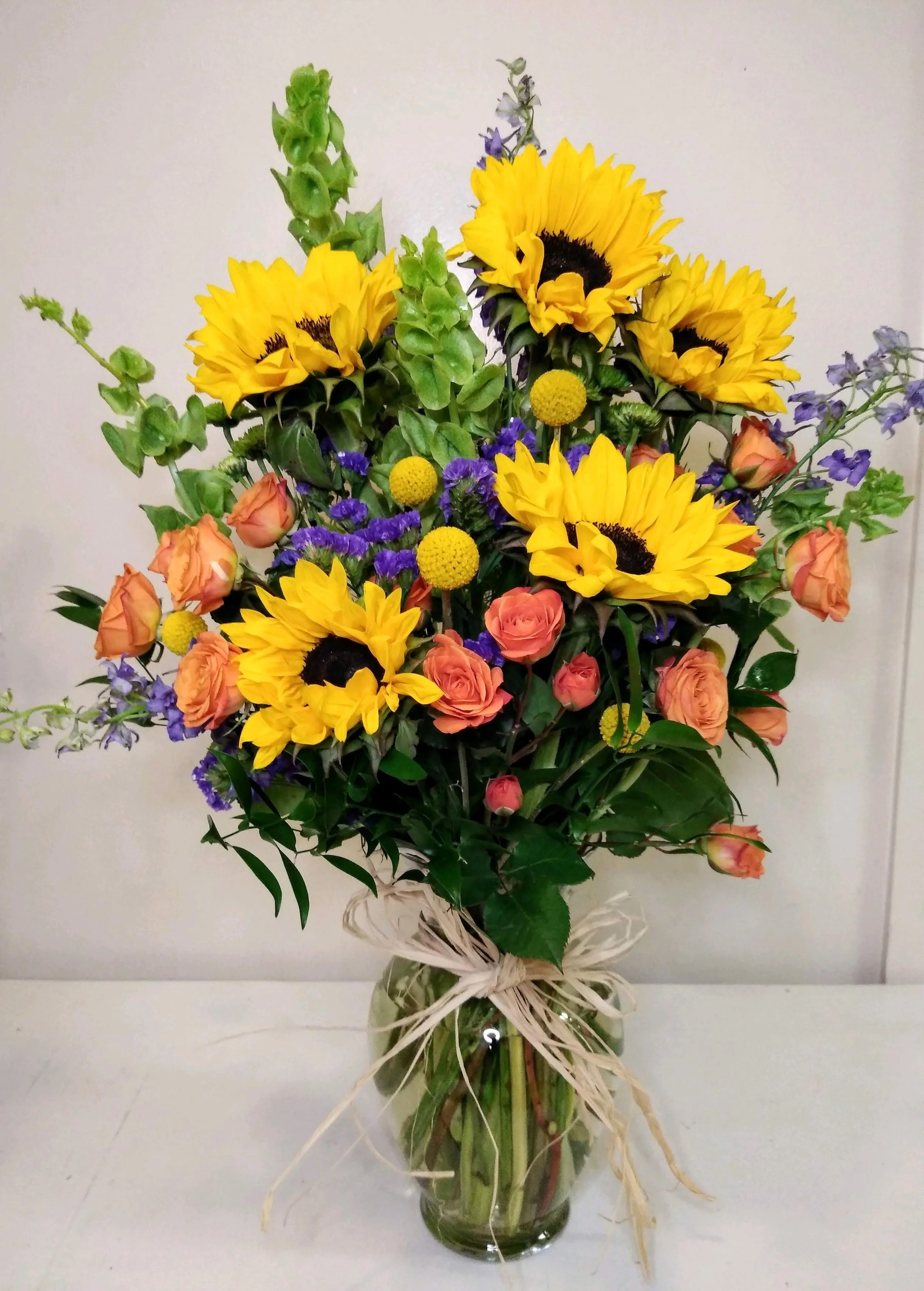 Sunlit Blooms Tall Vase Arrangement by Blooming Canyon