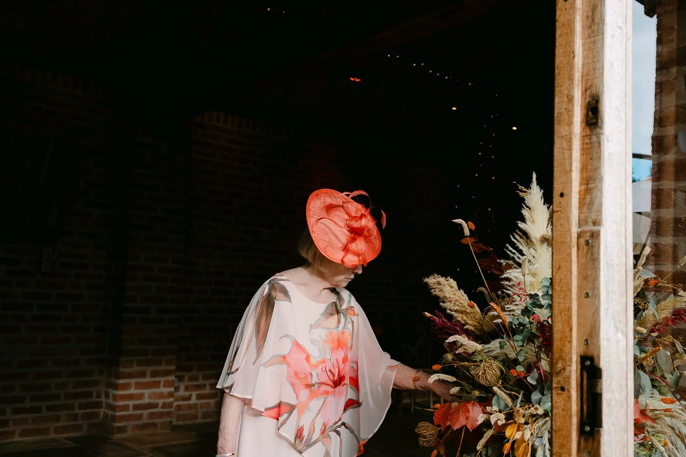 Guest looking at the flower display at the Bridal Barn 