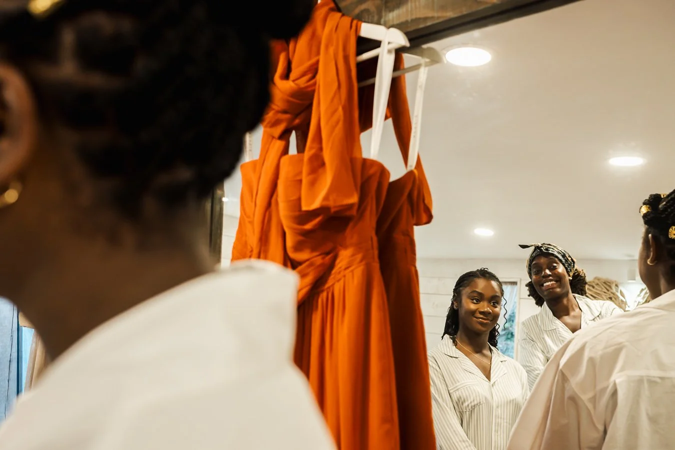 Best women smiling at the groom in the mirror 