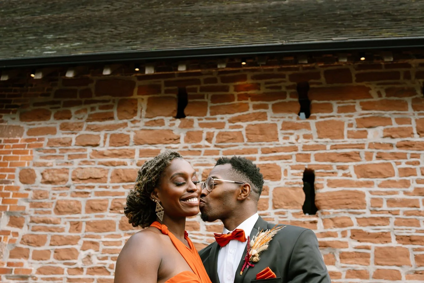Guests sharing a kiss at the Bridal Barn, Bridgnorth, Shropshire. 