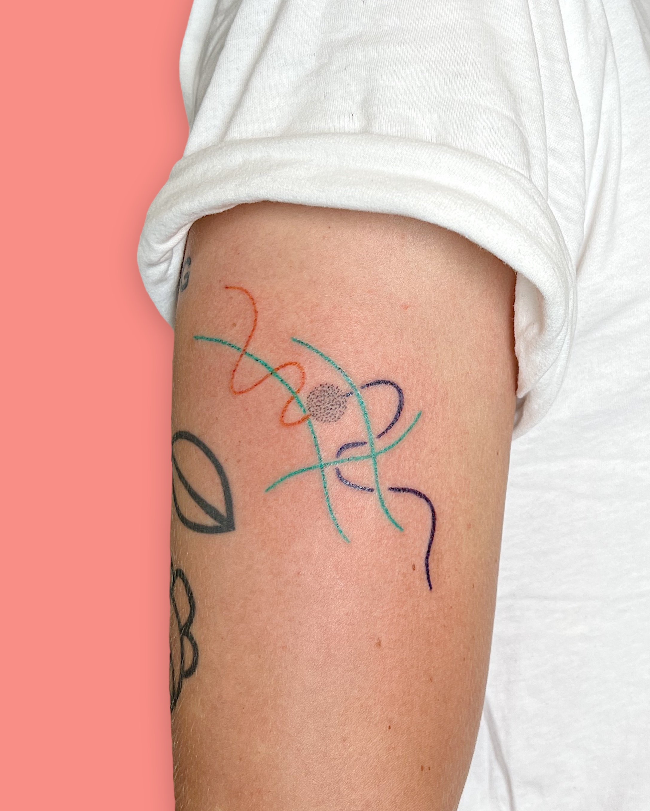 Abstract curvy lines tattooed on the arm by Madame Unikat.JPG
