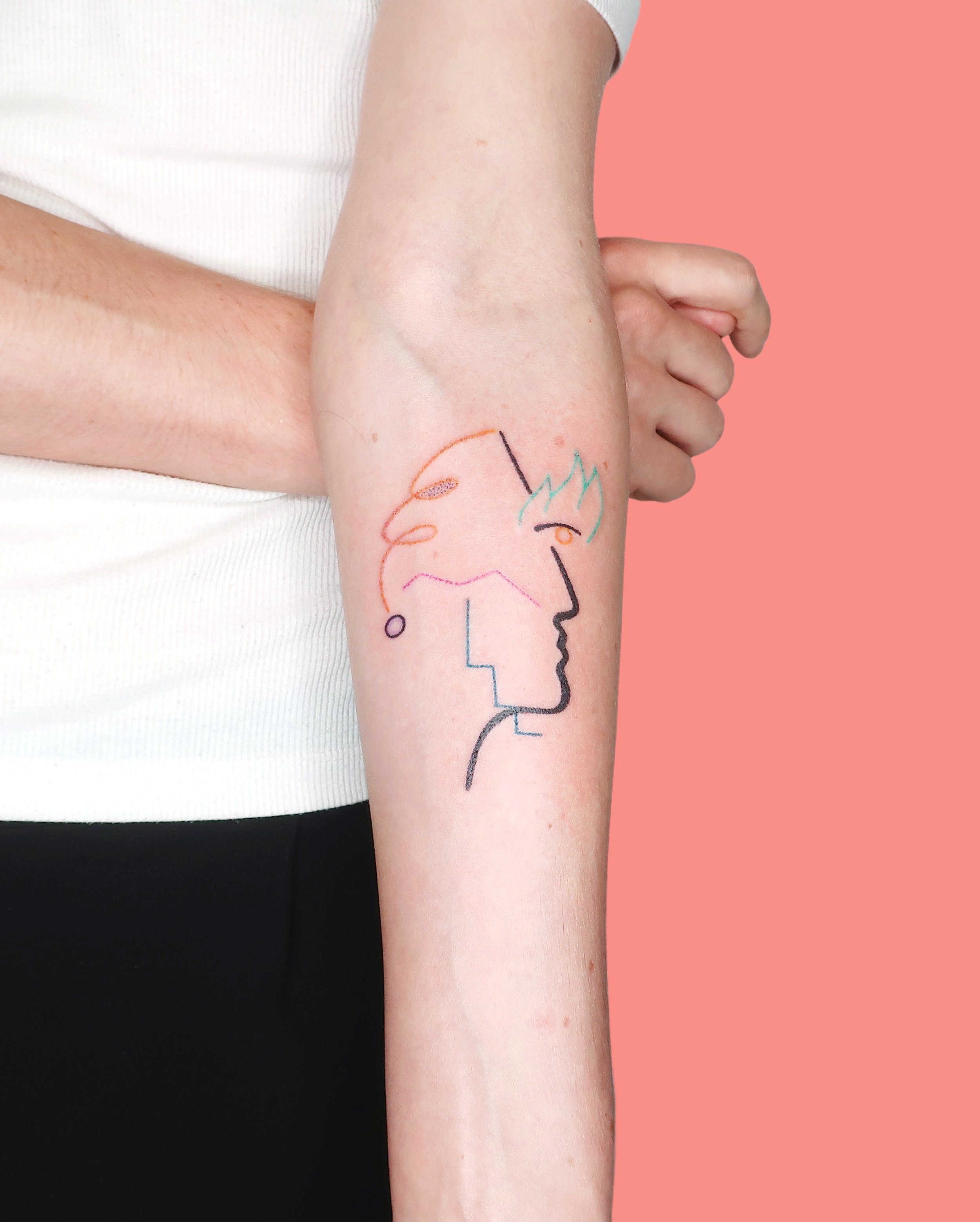 Mix of a minimal profile and some abstract elements tattooed on inside of lower arm by Madame Unikat.JPG