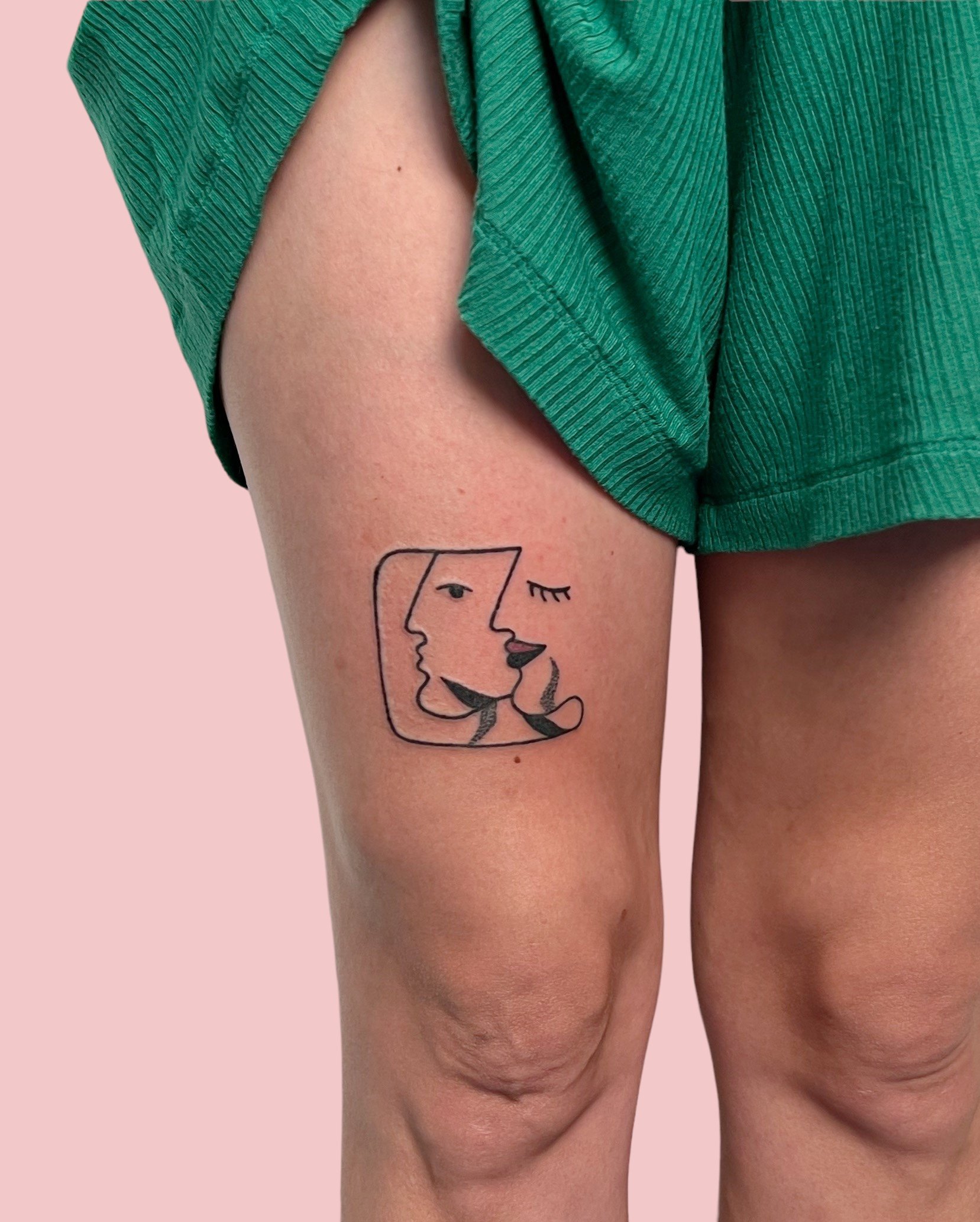Two minimal profiles in a frame with some branches tattooed on leg by Madame Unikat .JPG