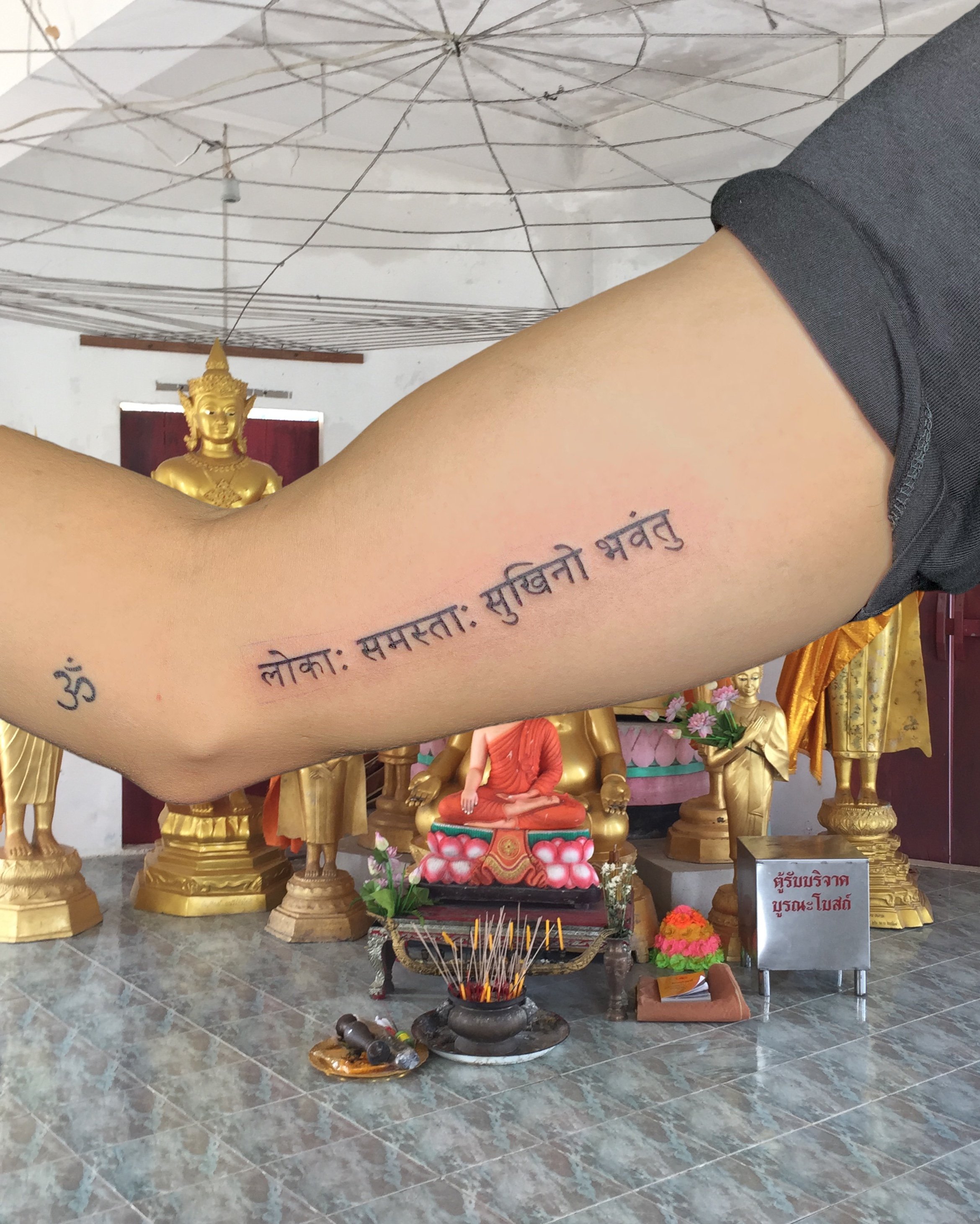 Tattoo of a sanscrit scripture inside the biceps.JPG