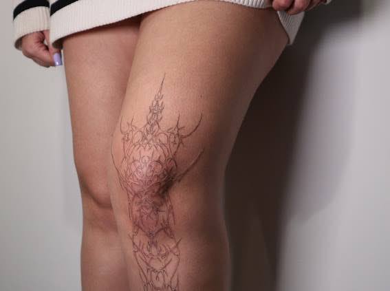 Abstract tattoo on leg by Traipstats.jpg