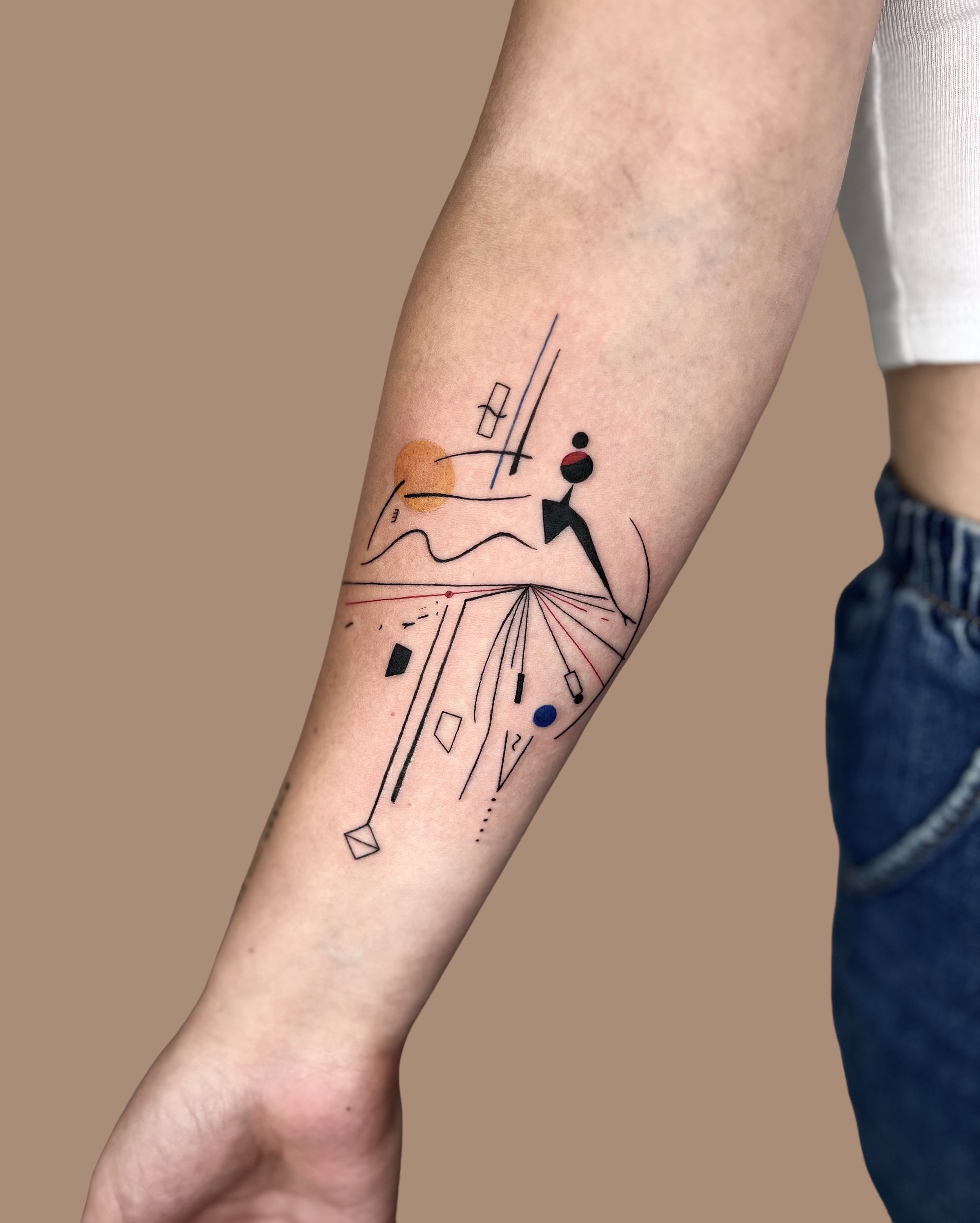 Abstract composition tattooed on forearm by Kirii lines.JPG