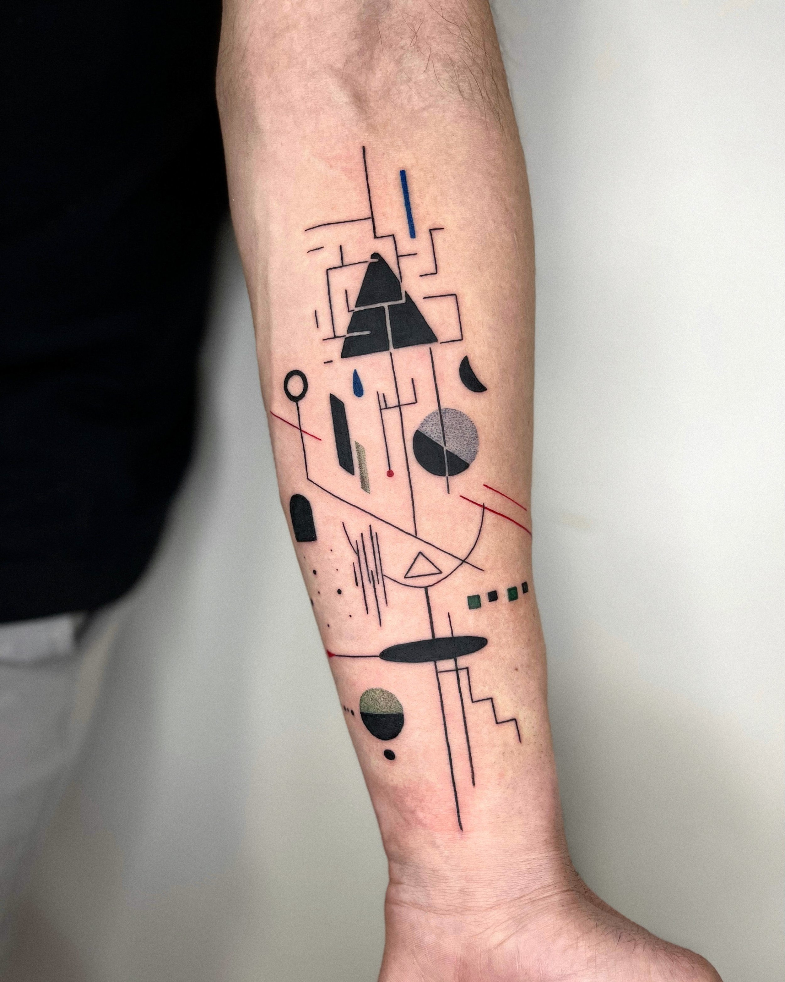 Abstract tattoo on Forearm by Kirii lines.JPG