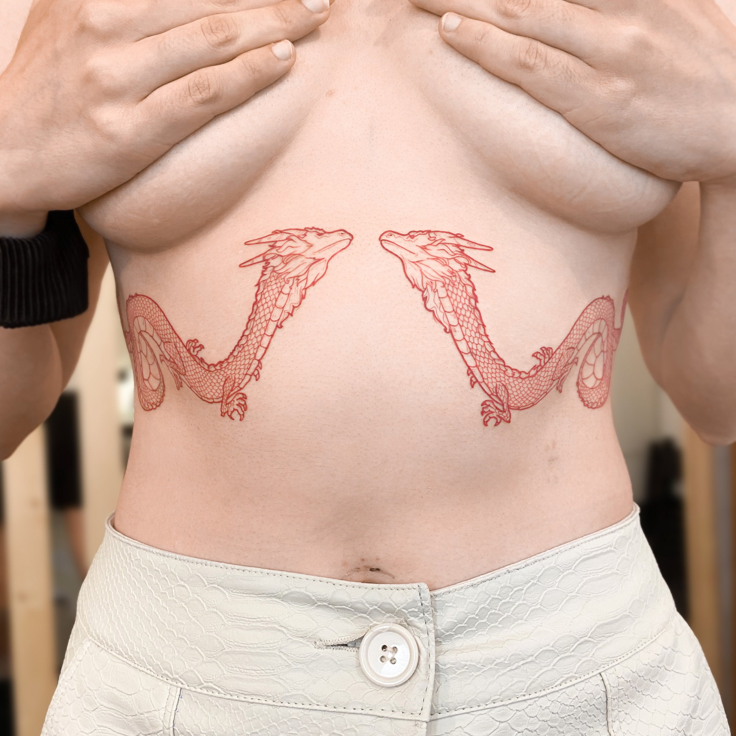 Red dragons tattooed on the stomach by Boy.brush.ttt.jpg