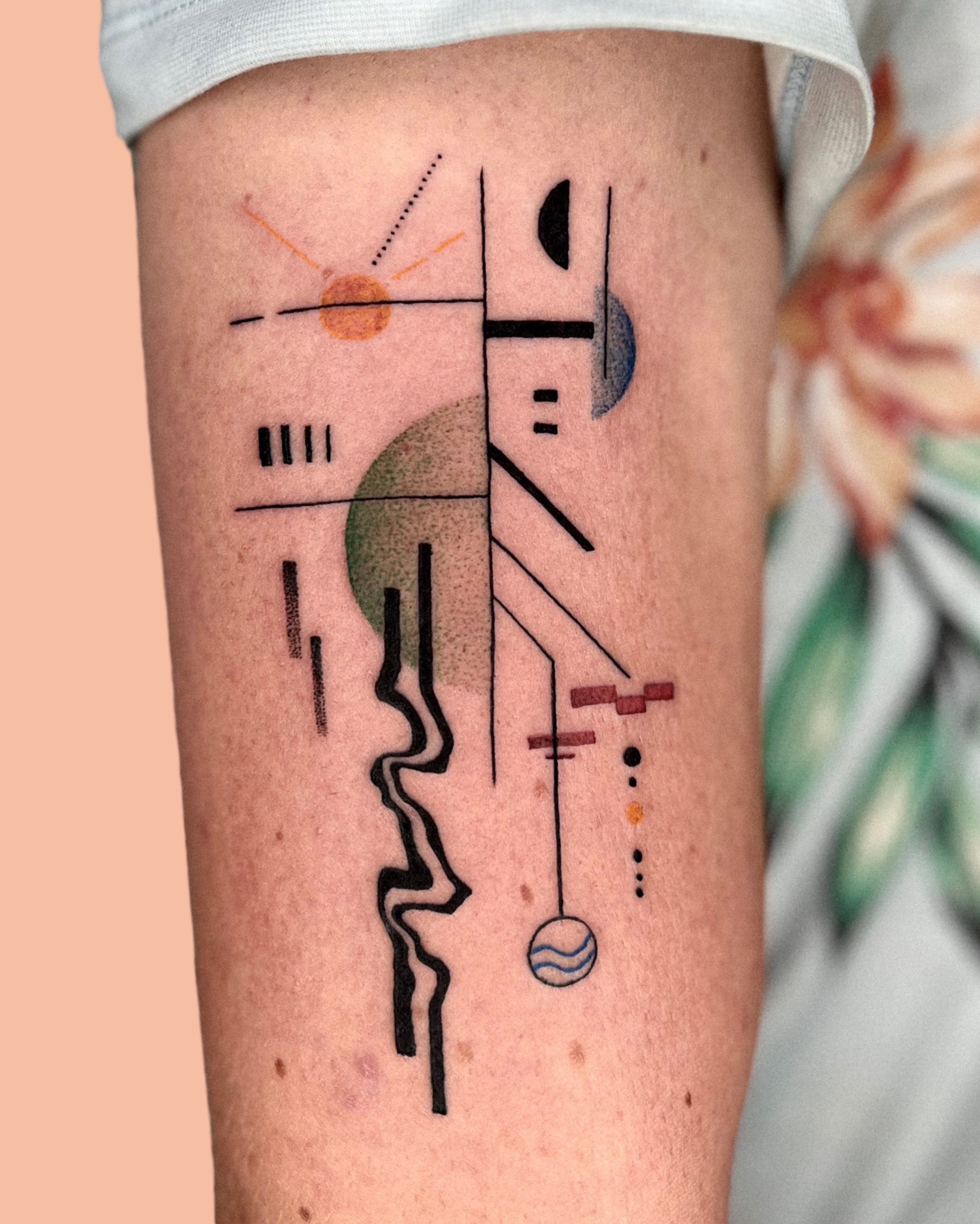 Abstract composition on arm tattooed by kirii lines.JPG