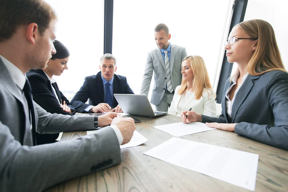 business people discussing contract.jpg